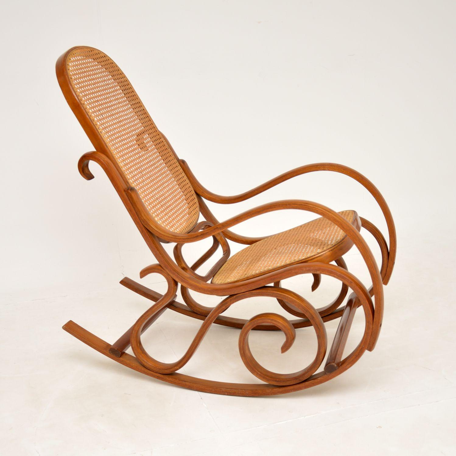 A stunning and iconic design, this is the number 21 bentwood rocking chair by Thonet. This model was likely made in Czechoslovakia in one of the former Thonet factories which used the Thonet machinery in the mid twentieth century. It dates from