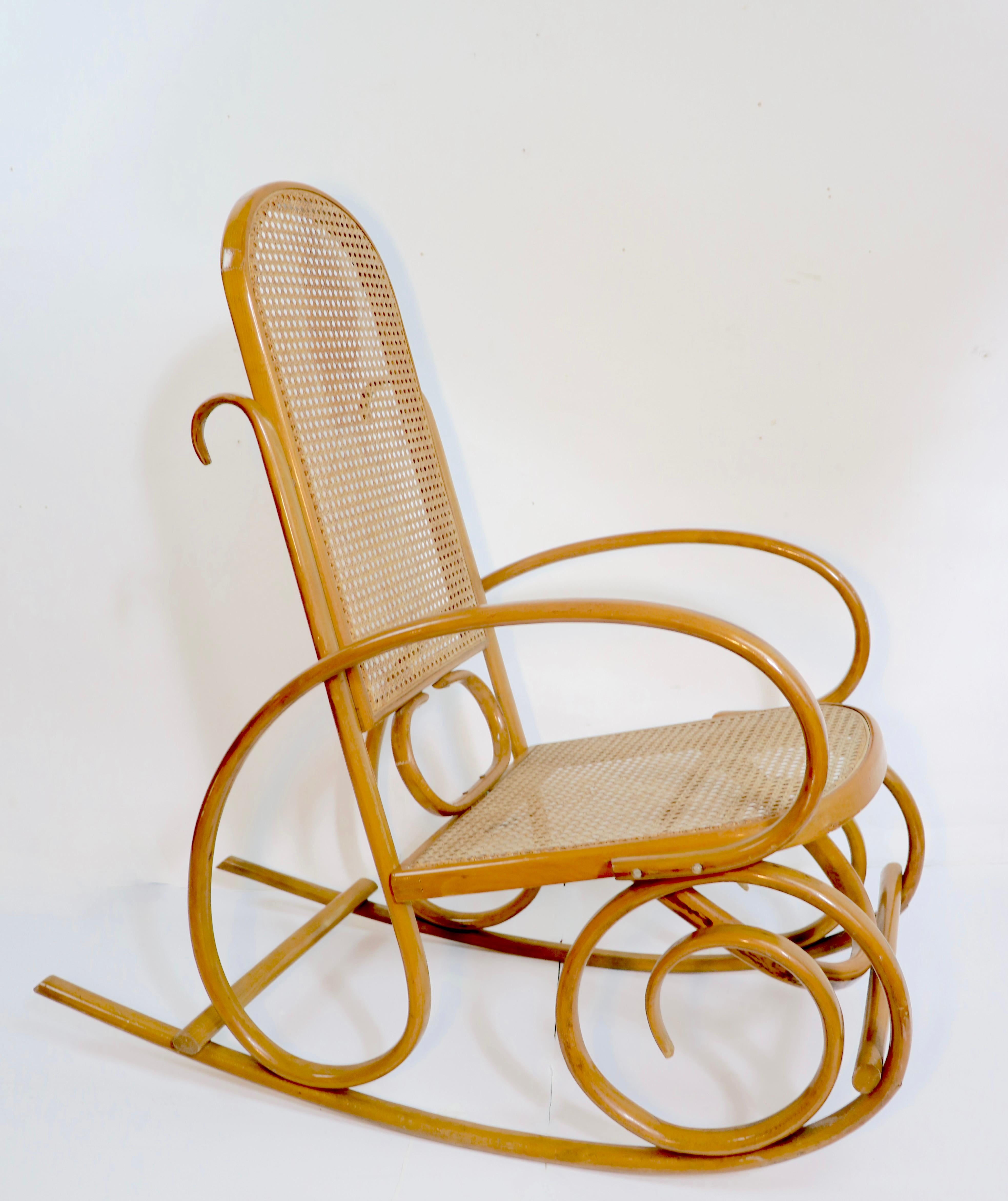 Cane Vintage Bentwood Rocking Chair Att. to Thonet For Sale