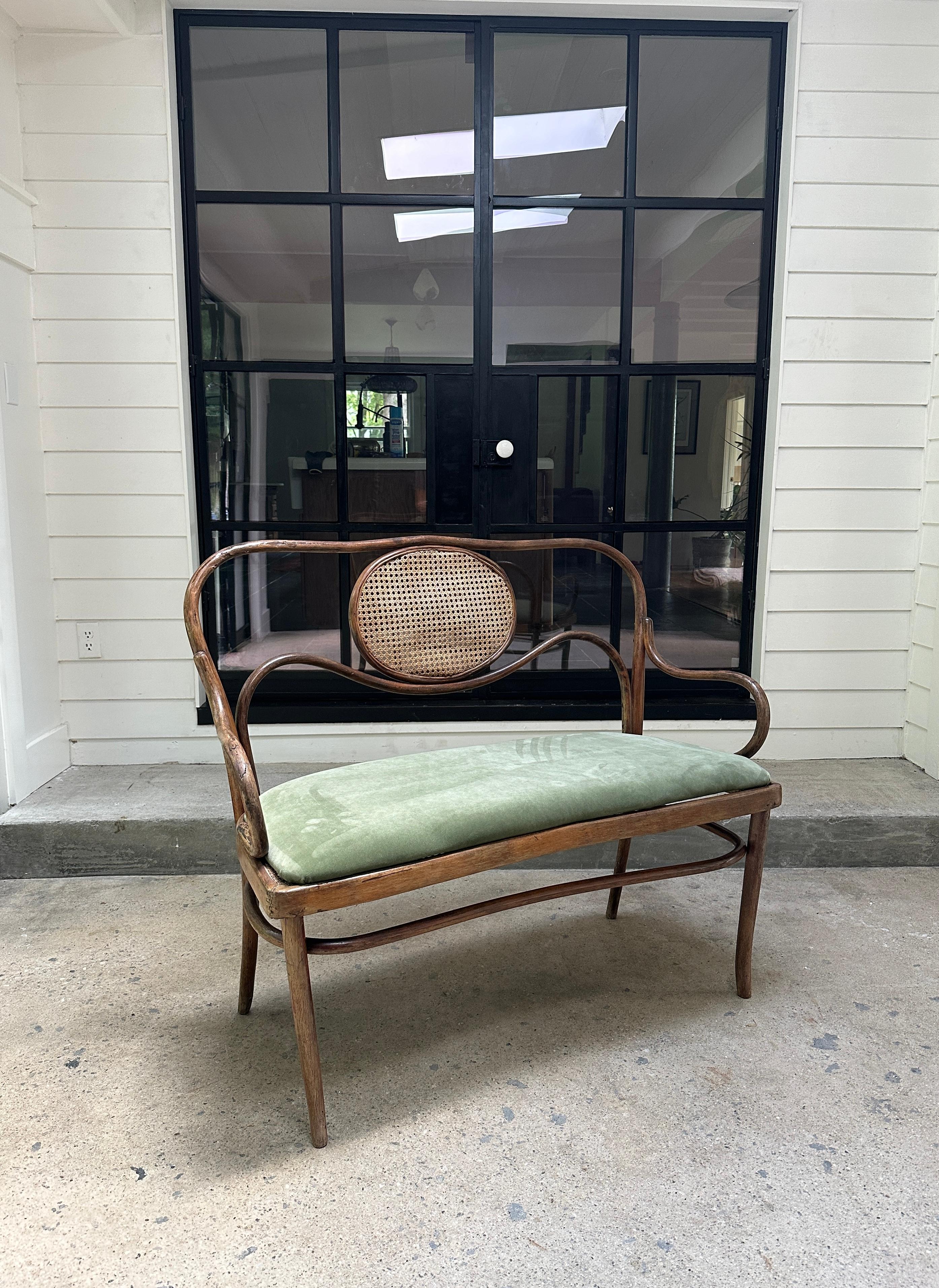 Austrian Vintage bentwood settee bench in the style of Thonet. Circa 1940s