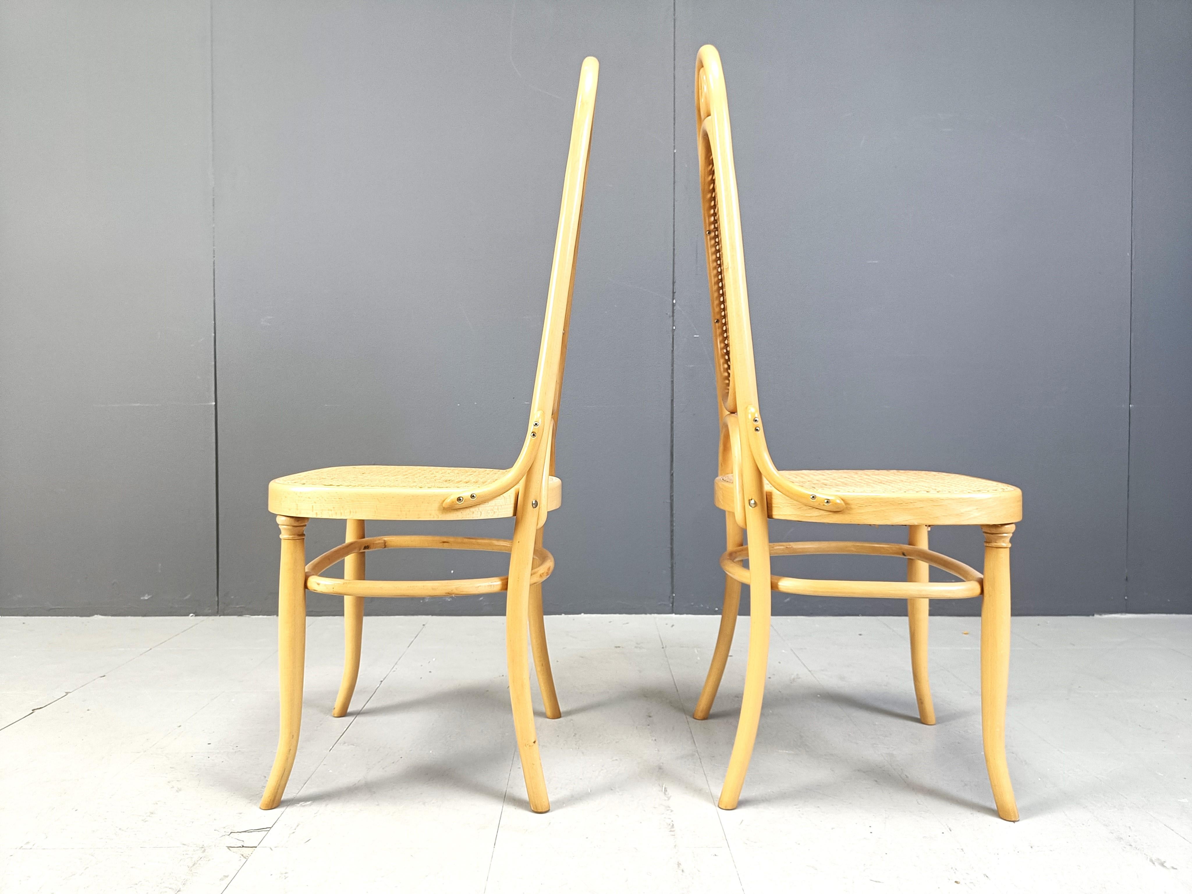 Set of 4 Thonet style 'Long johns' high back dining chairs.

Gorgeous 'art nouveau' design era dining chairs made from bentwood and cane webbing seats and backrests.

1970s - Czech Republic

Dimensions:

Measurements: 
Height: 111cm
Width: