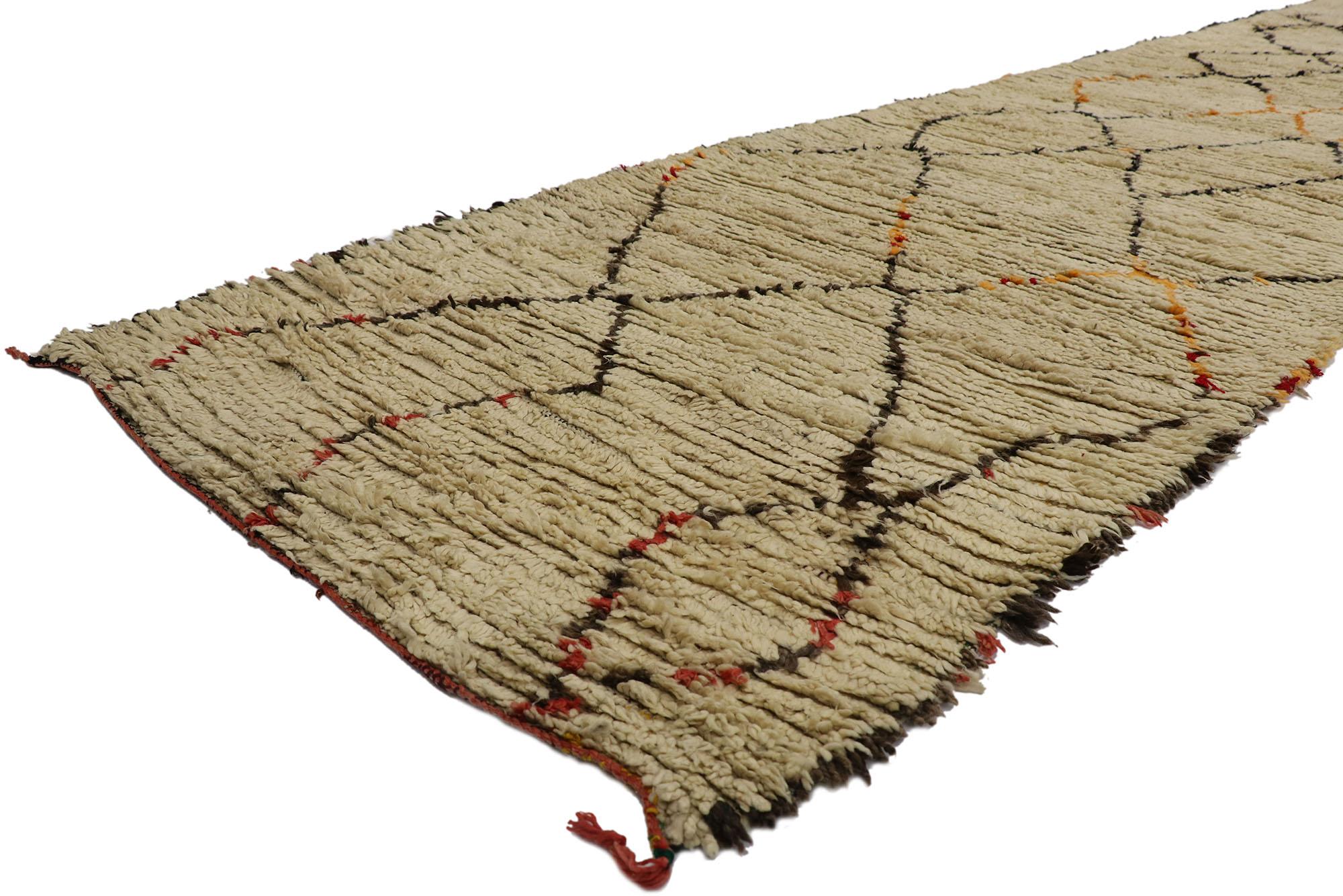 21381 Vintage Berber Azilal Moroccan runner with Tribal Style 03'10 x 16'08. With its simplicity, plush pile and tribal style, this hand knotted wool vintage Berber Moroccan Azilal runner is a captivating vision of woven beauty. It features a
