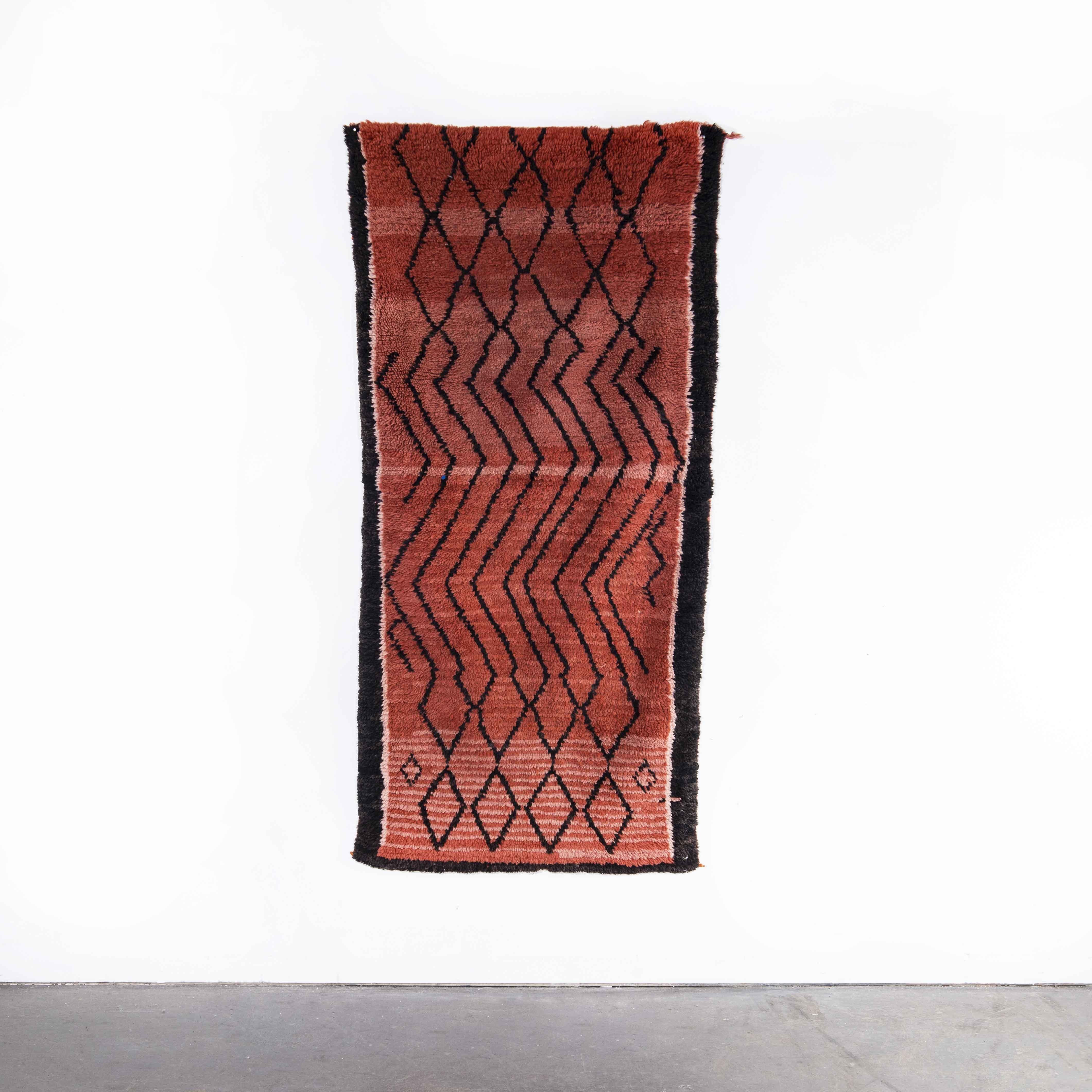 Vintage Berber Azilal red washed diamond pattern graphic rug
Vintage Berber Azilal red washed diamond pattern graphic rug. Azilal rugs are the most exuberant and colourful of Berber rugs, Diamonds shapes and strong lines play heavily into the