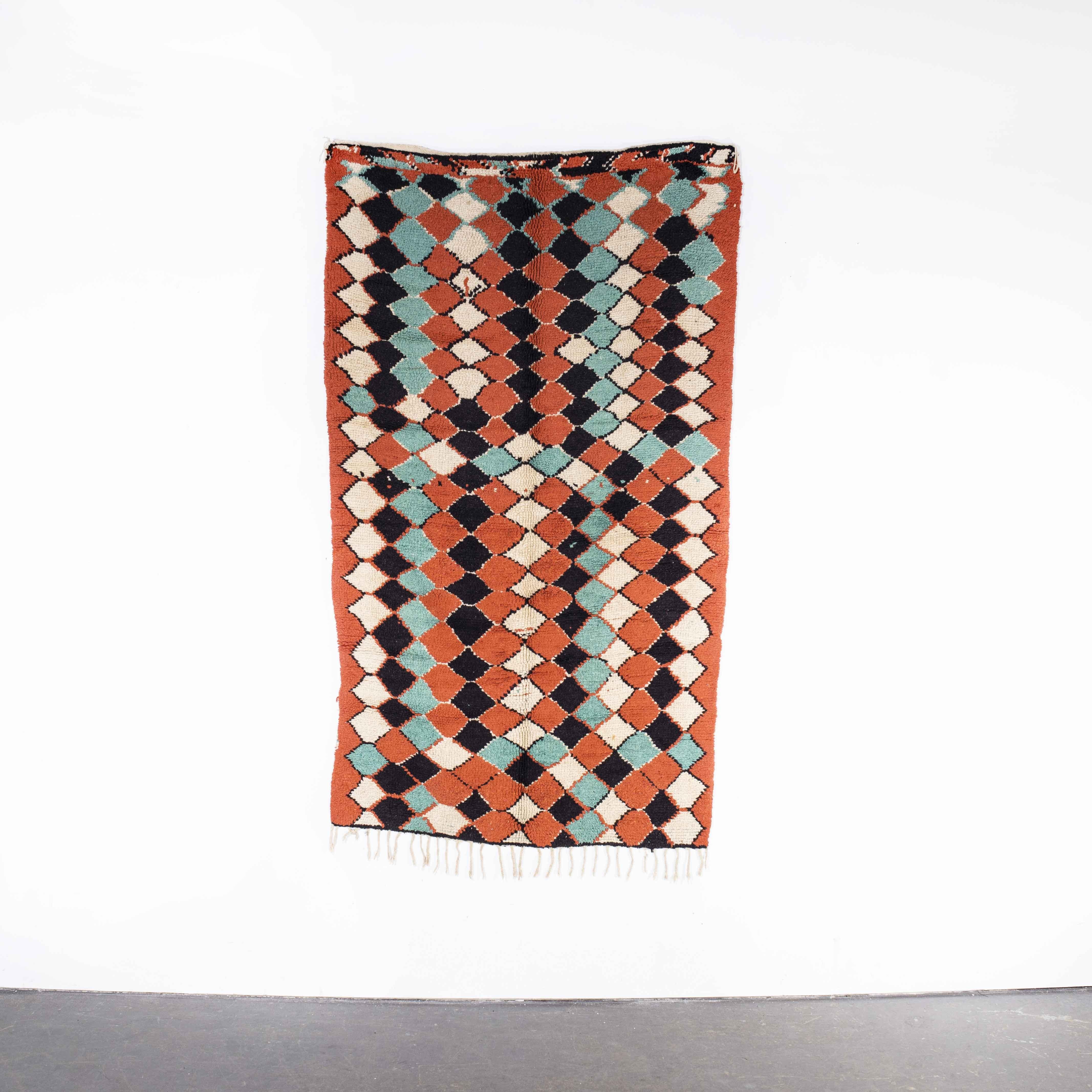 Vintage Berber Azilal rug – Bright Diamond Wool
Vintage Berber Azilal rug – Bright Diamond Wool. Azilal rugs are the most exuberant and colourful of Berber rugs, Diamonds shapes and strong lines play heavily into the design of Azilal rugs. They are