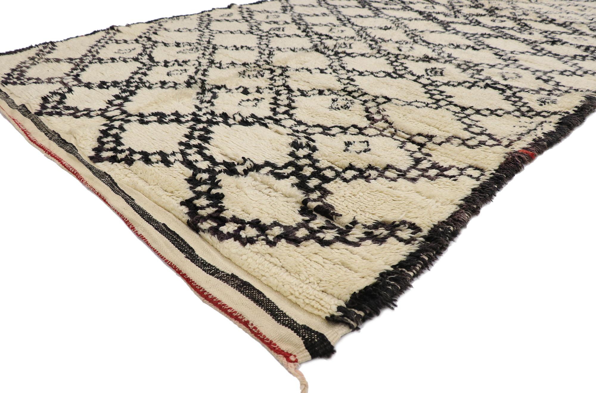 21362 Vintage Berber Beni Ourain Moroccan rug with Mid-Century Modern Style 06'02 x 11'05. With its simplicity, plush pile and Mid-Century Modern style, this hand knotted wool vintage Berber Beni Ourain Moroccan rug is a captivating vision of woven