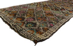 Tapis berbère marocain vintage Boujad avec style bohème chic et tribal