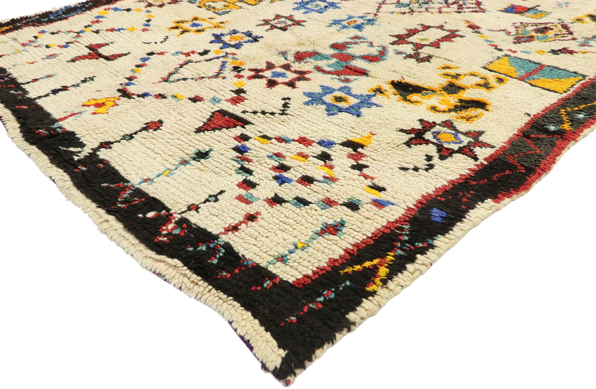 20697, vintage Berber Moroccan Azilal rug with boho chic tribal style and Hygge Vibes. Softer yet no less striking, this hand knotted wool contemporary Moroccan rug embodies boho chic tribal style with hygge vibes. The abrashed beige field features