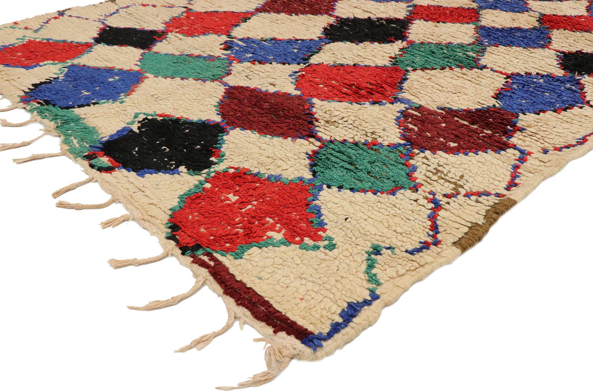 20619, vintage Berber Moroccan Azilal rug with tribal style. Abrashed sandy-beige hues provides the perfect backdrop for the vivid colors featured on this vintage Berber Moroccan Azilal rug. The starkly-colored diamond pattern stands out in contrast