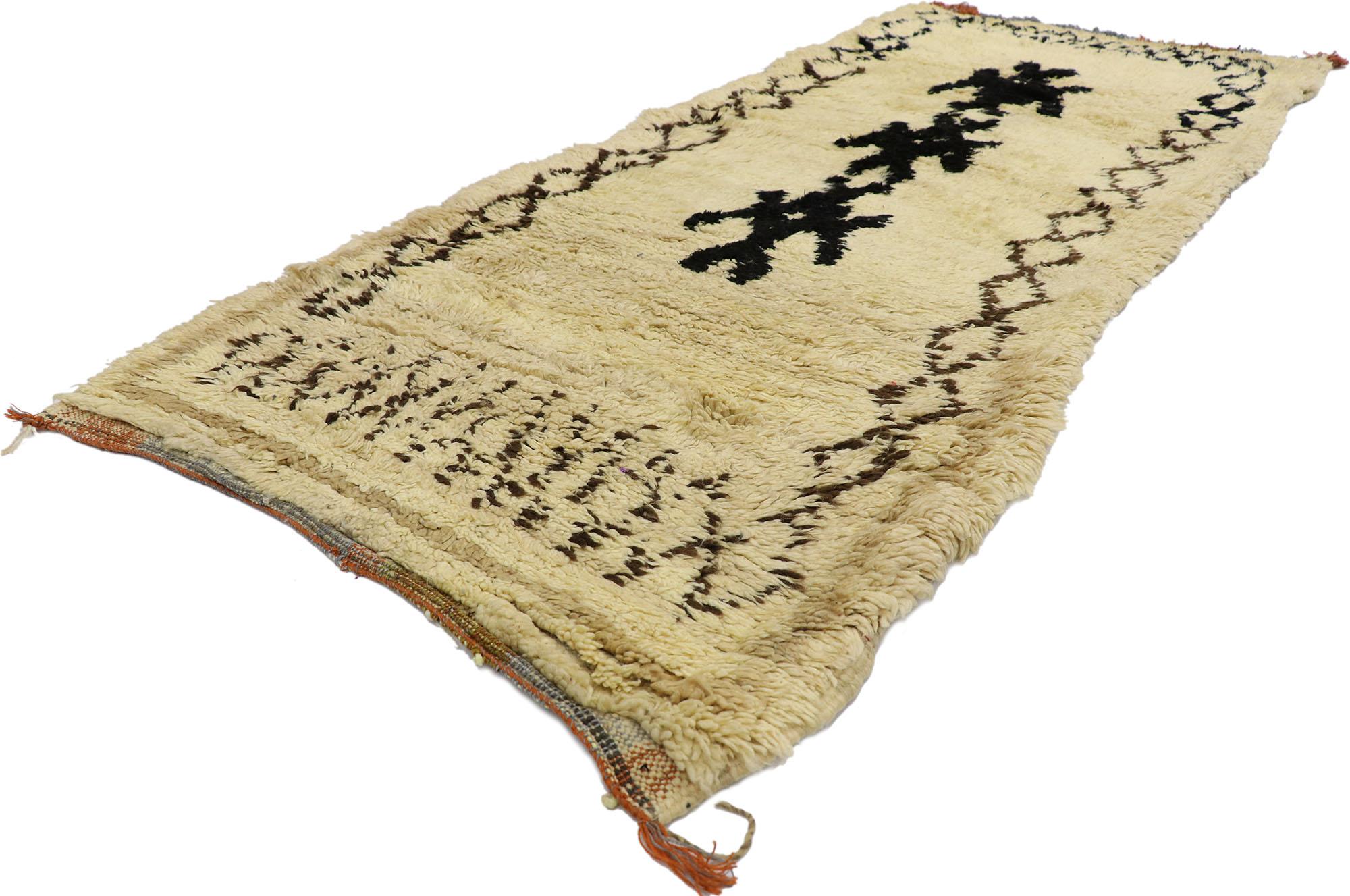 21574 Vintage Berber Moroccan Azilal rug with Tribal Style 02'11 x 06'10. With its simplicity, plush pile and tribal style, this hand knotted wool vintage Berber Moroccan Azilal rug is a captivating vision of woven beauty. The abrashed beige field