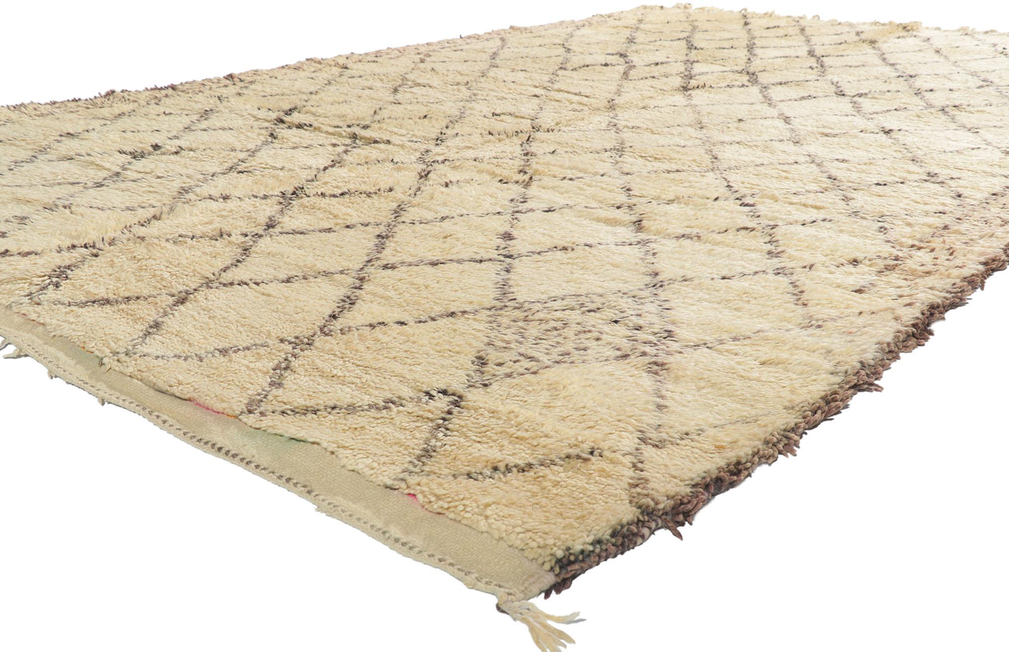 21408 Vintage Berber Moroccan Beni Ourain Rug 07'02 x 11'01. With its simplicity, plush pile and tribal style, this hand knotted wool vintage Berber Beni Ourain Moroccan rug is a captivating vision of woven beauty. It features a diamond lattice