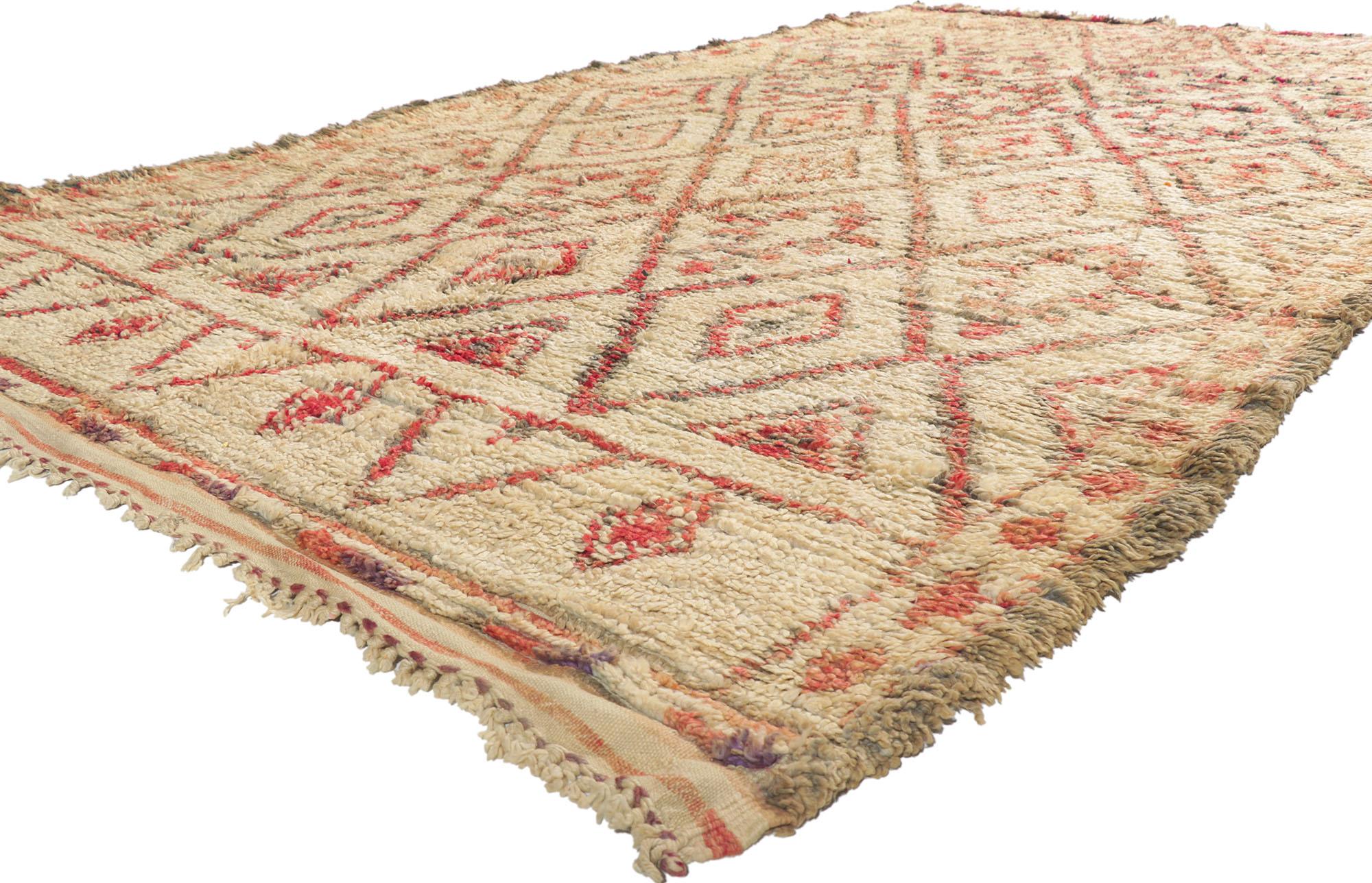 21396 Vintage Moroccan Beni Ourain Rug, 06'05 x 10'06.
With its simplicity, plush pile and tribal style, this hand knotted wool vintage Berber Beni Ourain Moroccan rug is a captivating vision of woven beauty. It features a diamond lattice composed