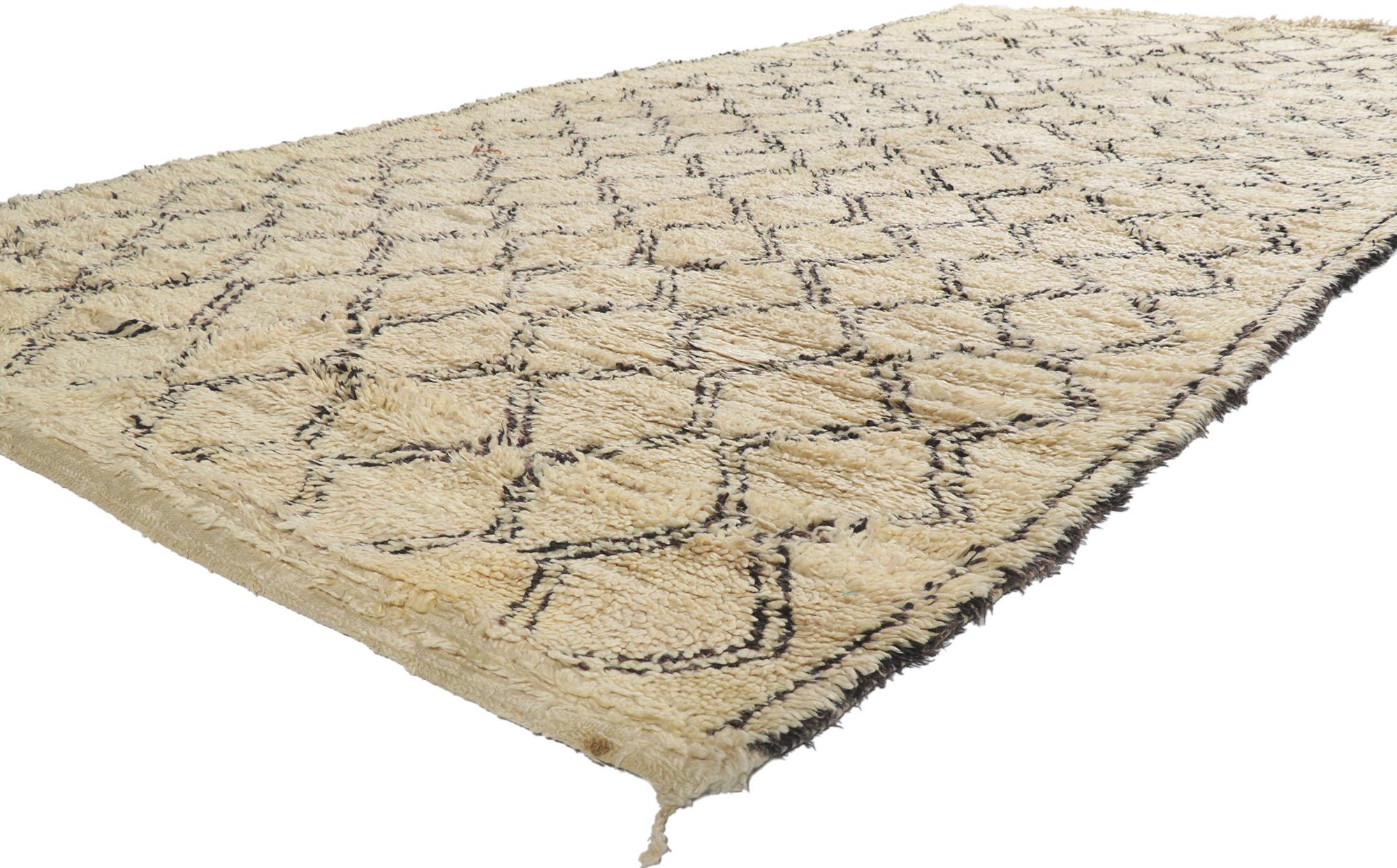 21390 Vintage Berber Moroccan Beni Ourain Rug. With its simplicity, plush pile and tribal style, this hand knotted wool vintage Berber Beni Ourain Moroccan rug is a captivating vision of woven beauty. It features a diamond lattice composed of