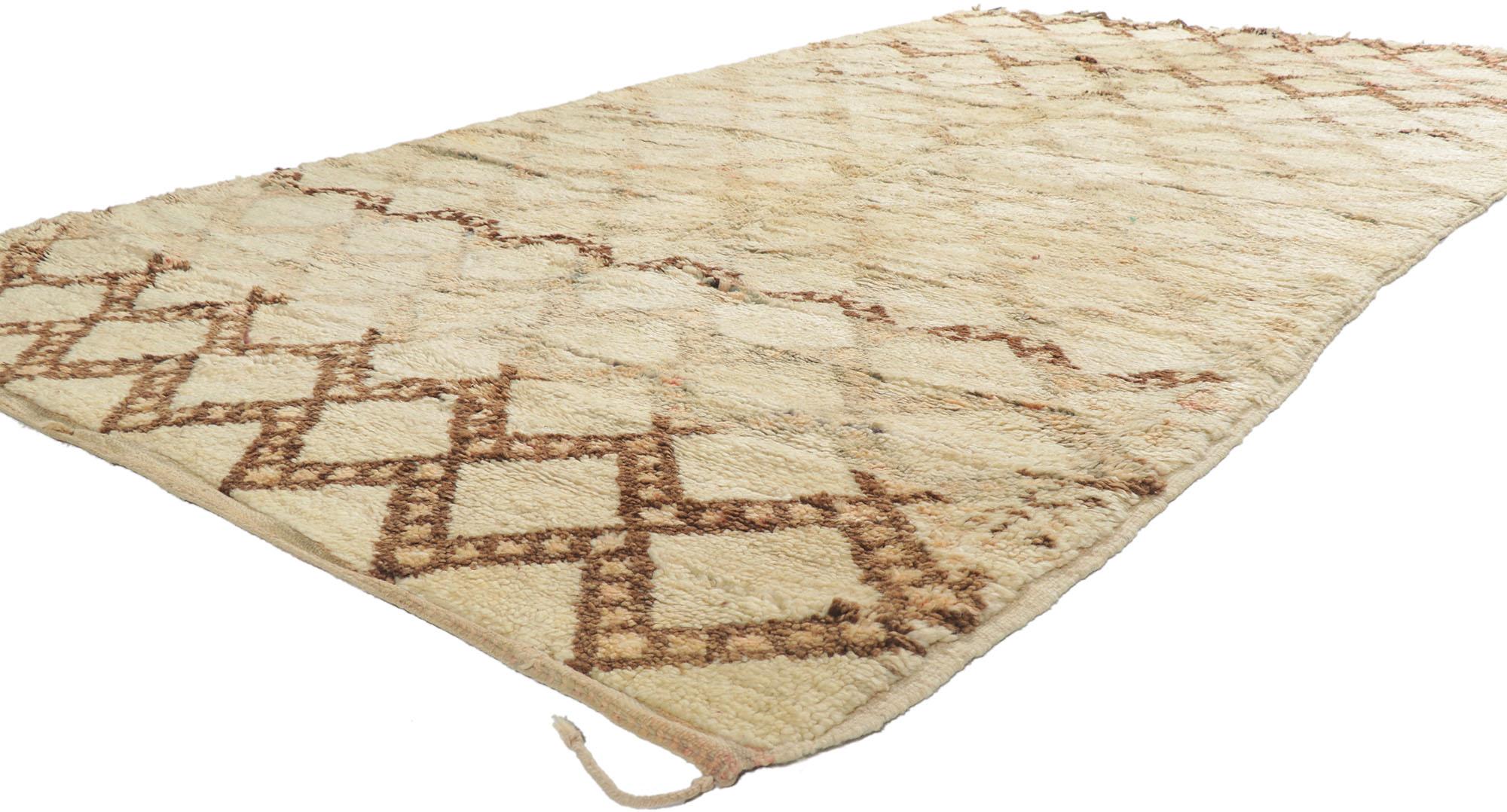21379 Vintage Moroccan Beni Ourain Rug, 05'07 x 10'02.
Shibui meets Midcentury Modern style in this hand knotted wool vintage Beni Ourain Moroccan rugy. The faded diamond design and soft earthy colors woven into this piece work together creating an