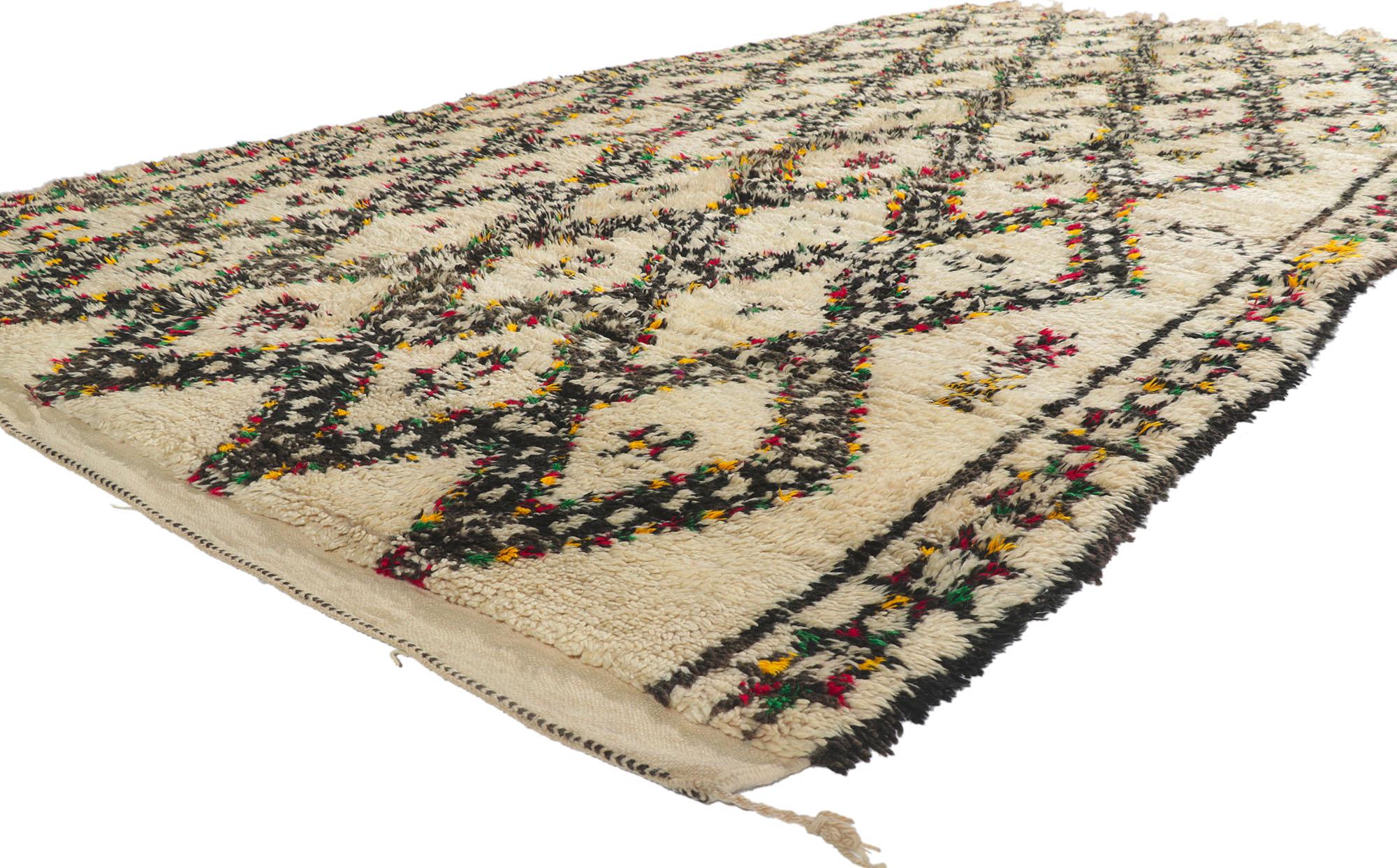 21375 Vintage Moroccan Beni Ourain Rug, 06'04 x 11'09​. Emerging from the Beni Ourain tribe, a prominent segment of Morocco's expansive Berber community, these Moroccan rugs are meticulously fashioned from untreated sheep's wool, accentuating their