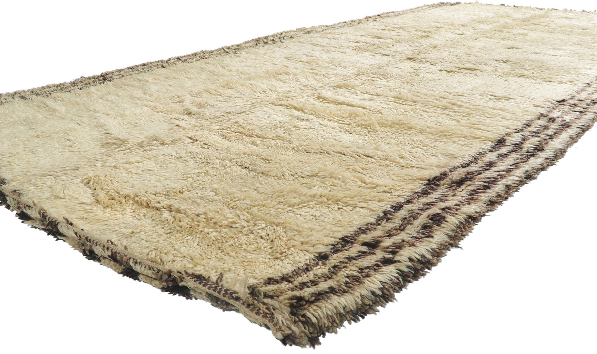 21410 vintage Berber Moroccan Beni Ourain rug 06'00 x 13'02. With its simplicity, plush pile, incredible detail and texture, this hand knotted wool vintage Beni Ourain Moroccan rug is a captivating vision of woven beauty. Imbued with beige hues, the