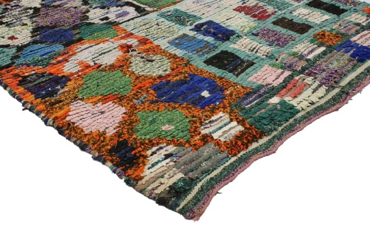 74767 Vintage Berber Moroccan Boucherouite Rug, Colorful Moroccan Shag Accent Rug 03'07 x 06'02. Boucherouite rugs were woven by Berber women in brilliant color palettes portraying the rich history of the Berber tribes' African influence. This