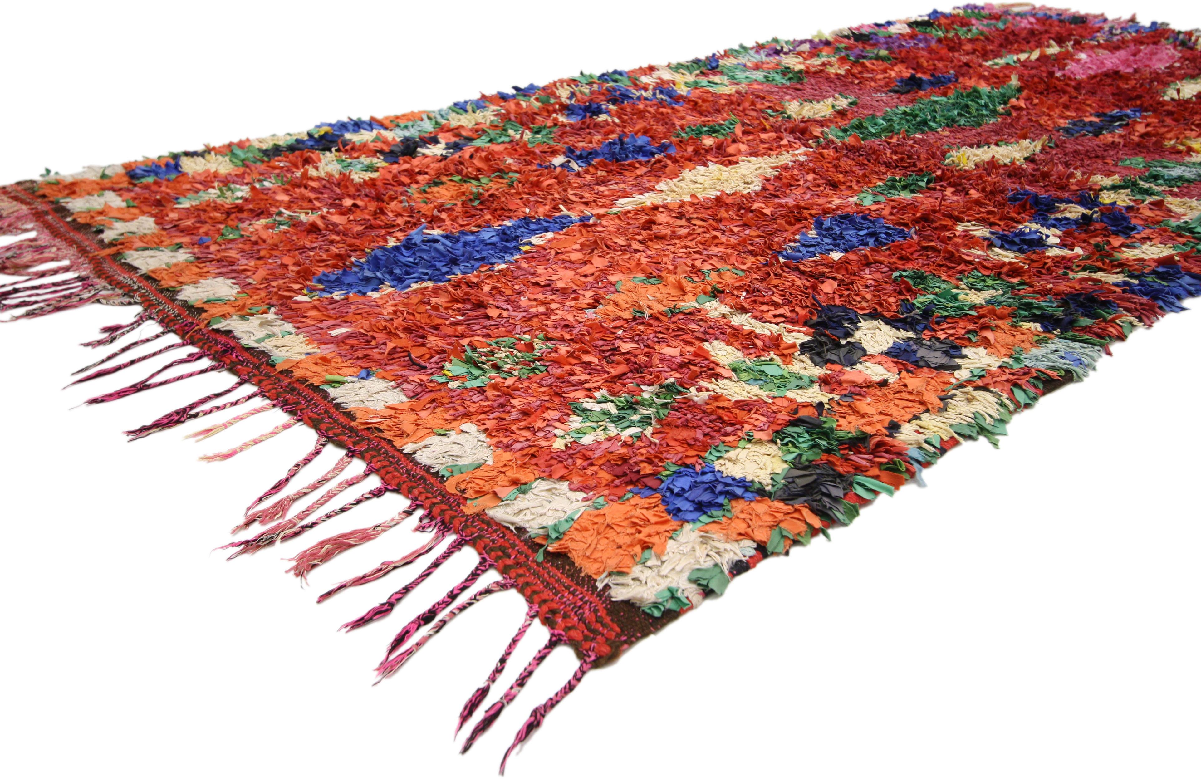 74726, vintage Berber Moroccan Boucherouite rug. This Vintage Berber Moroccan Boucherouite rug marries the vintage style of the Berbers with a vivacious color scheme geometric design that is a contemporary style. The center of the Moroccan