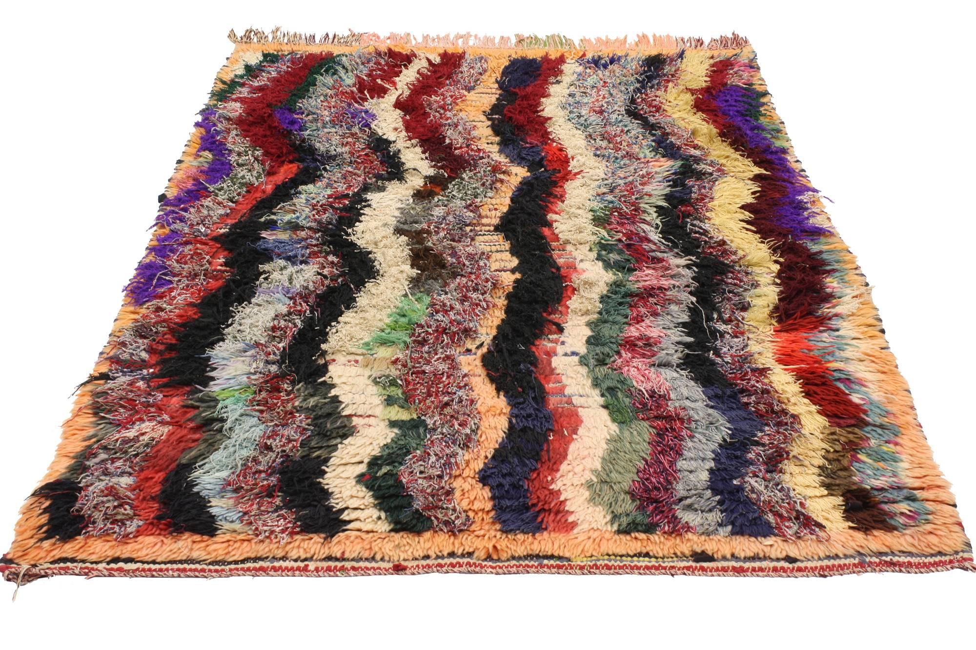 20510, vintage Berber Moroccan Boucherouite rug. This vintage Berber Moroccan Boucherouite rug marries the vintage style of the Berbers and the look of a more modern piece. This Berber Boucherouite rug features a vibrant and diverse color scheme
