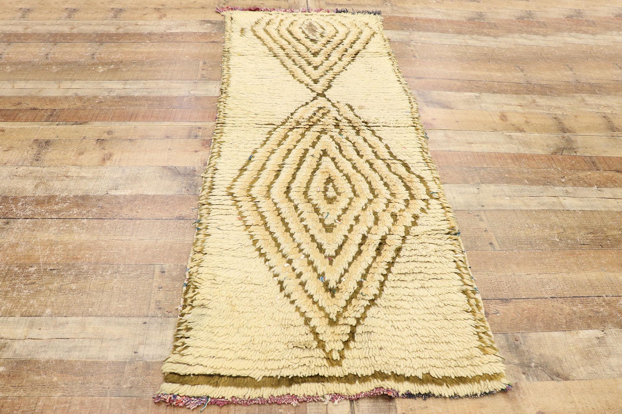 21585 Vintage Berber Moroccan Boucherouite rug with Modern Style 02'05 x 06'03. Warm and inviting, this hand-knotted wool and cotton vintage Berber Boucherouite Moroccan rug is a captivating vision of woven beauty. The abrashed beige field features