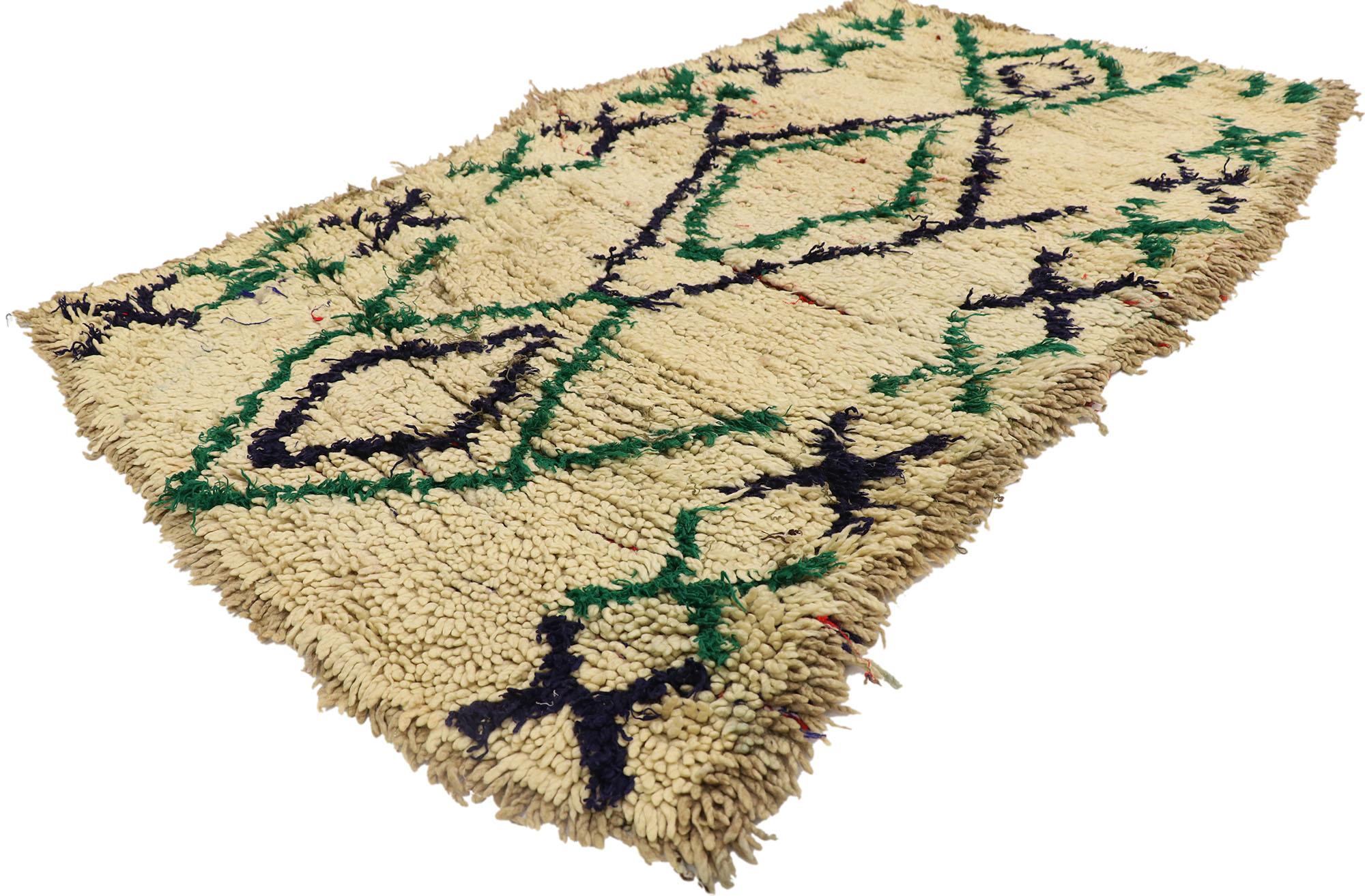21590 Vintage Berber Moroccan Boucherouite rug with Tribal Style 03'00 x 05'00. Warm and inviting, this hand-knotted wool and cotton vintage Berber Boucherouite Moroccan rug is a captivating vision of woven beauty. The abrashed beige field features