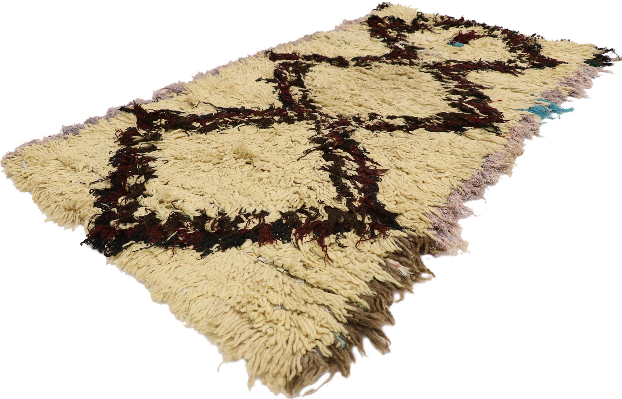 21580 Vintage Boucherouite Moroccan Rug, 02'09 x 04'09.
Nomadic charm meets natural elegance in this hand knotted vintage Boucherouite Moroccan rag rug. The simplistic diamond design and neutral colors woven into this piece work together creating a