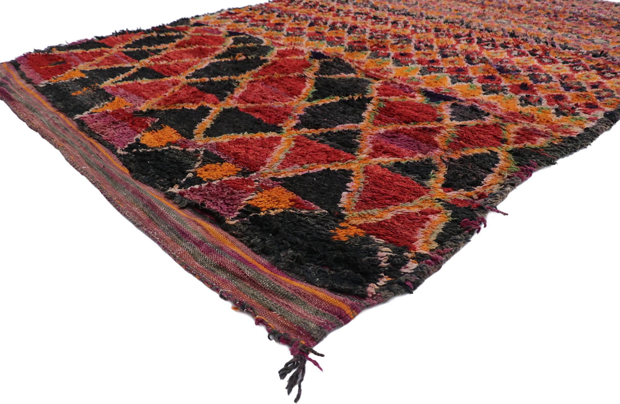 21284 Vintage Berber Moroccan Rug, 06'02 x 09'09.
Colorfully curated meets boho chic in this hand knotted wool vintage Berber Moroccan rug. The diamond design and rich earthy colors woven into this piece work together to bring forth an eclectic and
