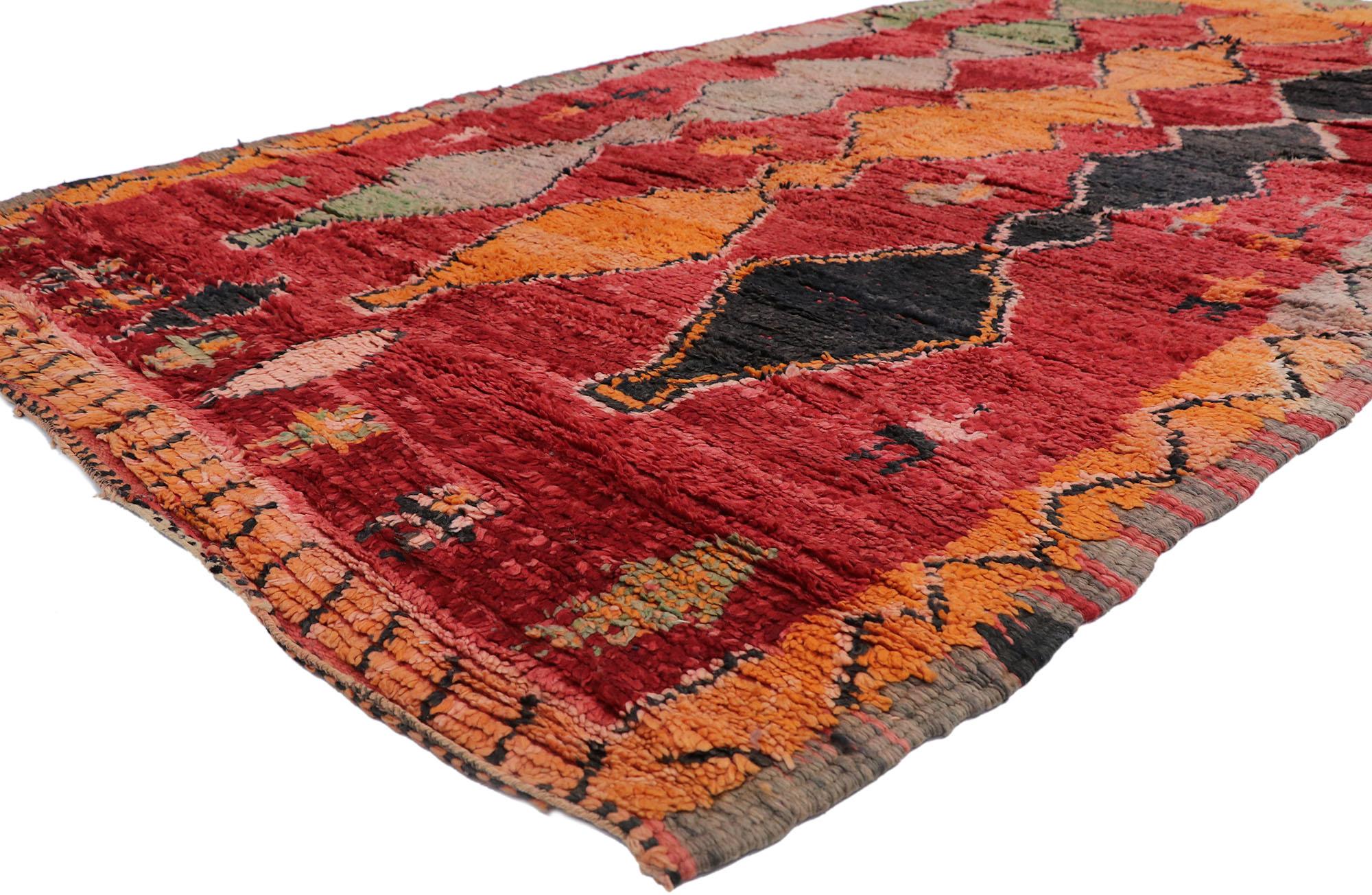 21306 Vintage Berber Moroccan Rug, 06'00 x 10'02.
Cozy nomad meets Maximalist style in this hand knotted vintage Moroccan rug. The intrinsic tribal design and lively colorway woven into this piece work together creating a cultured and curated