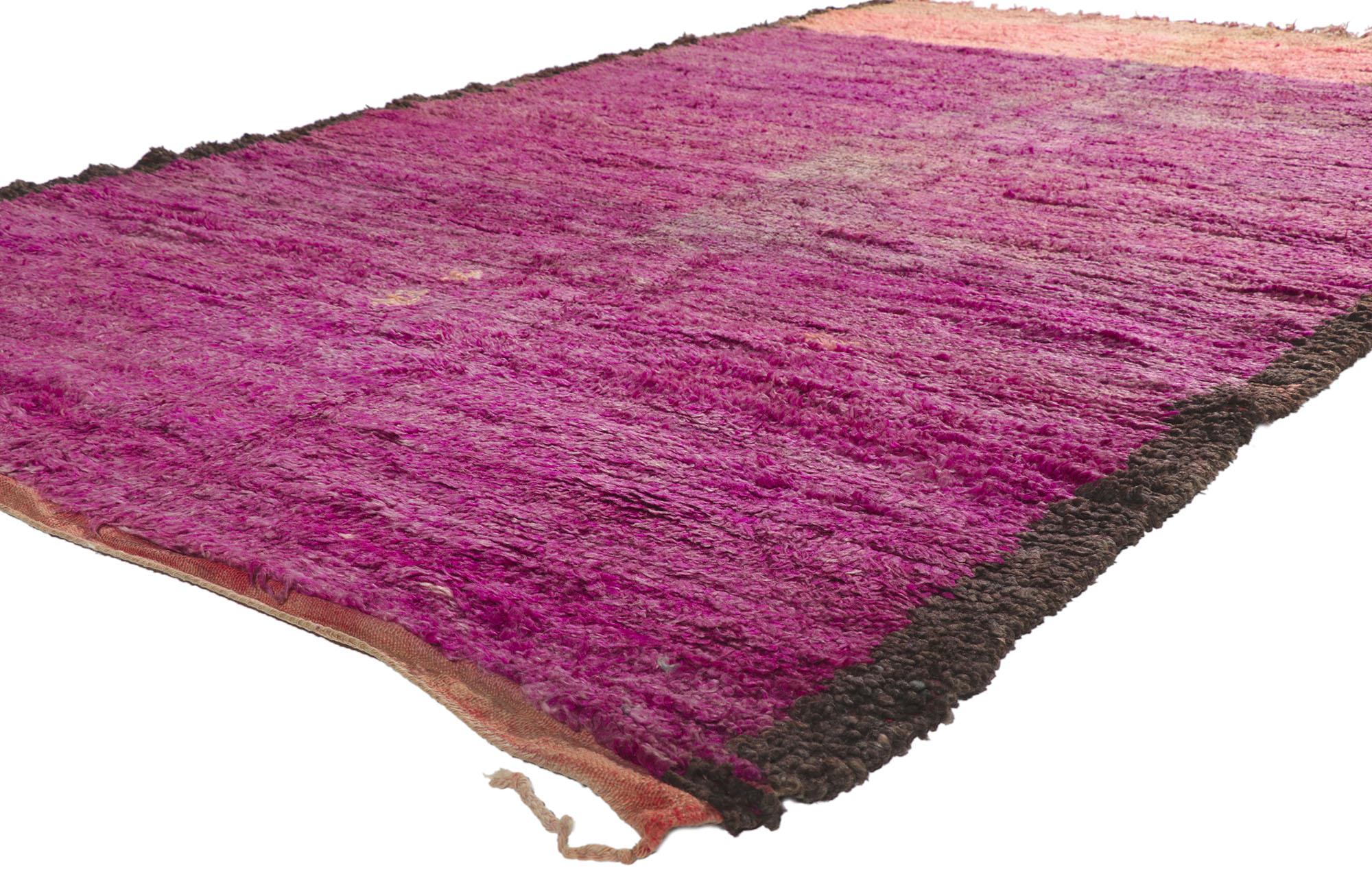 21219 Vintage Beni Mrirt Moroccan Rug, 06'00 x 09'07.
Effortless beauty and simplicity meets the eye in this hand-knotted wool vintage Beni Mrirt Moroccan rug. Imbued with magenta and pink hues, the rich waves of abrash of painterly-like brush