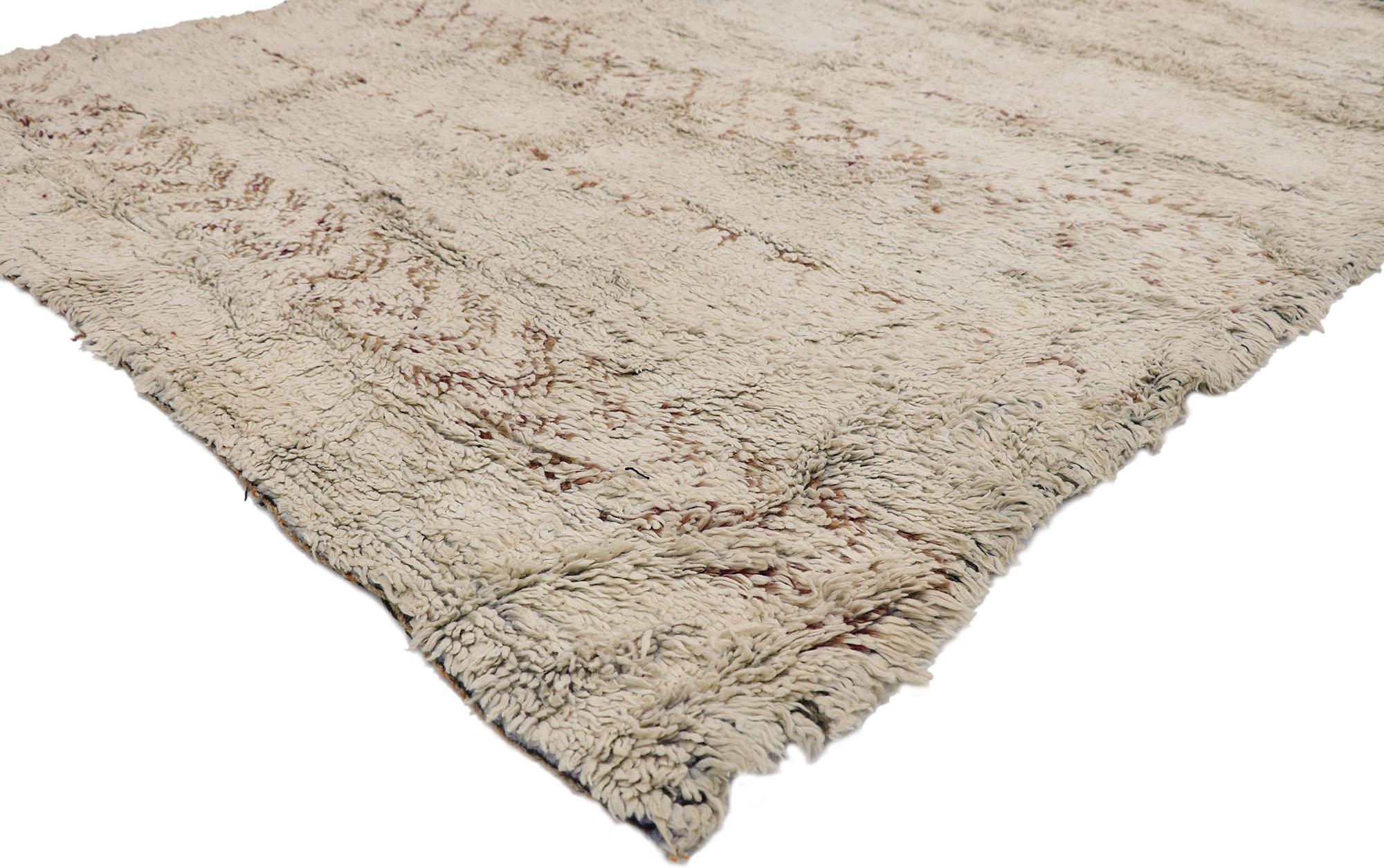 21427 Vintage Moroccan Rug, 05'06 x 07'02.
Nomadic charm meets relaxed familiarity in this hand knotted wool vintage Moroccan rug. The faded tribal design and neutral colorway woven into this piece work together creating a curated yet laid back
