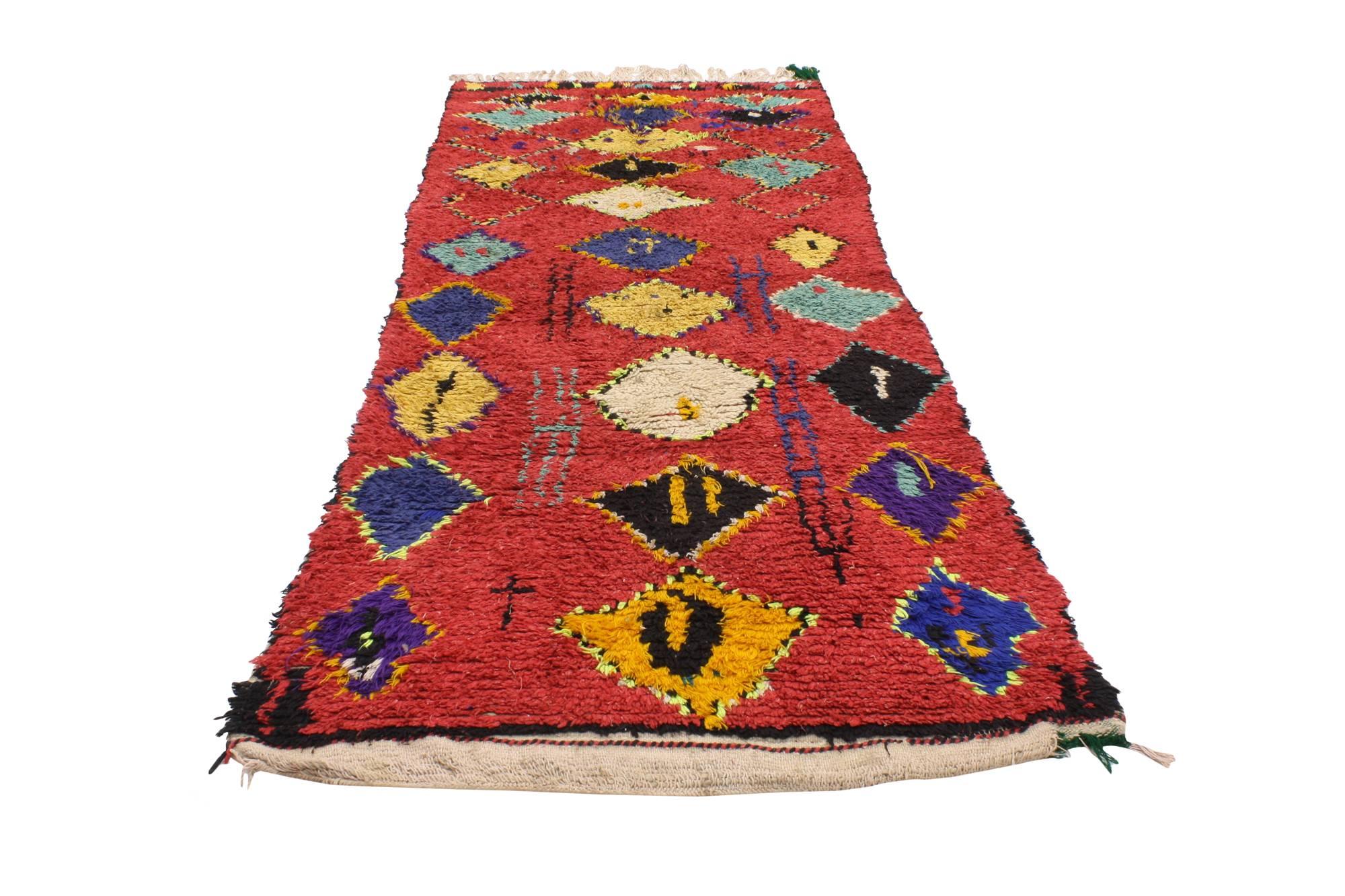 20470, vintage Berber Moroccan rug runner. A fiery shade of red provides a beautiful backdrop for the varied color diamonds that overlay this hand-knotted wool vintage Berber Moroccan rug runner. This Moroccan runner features three rows of stacked