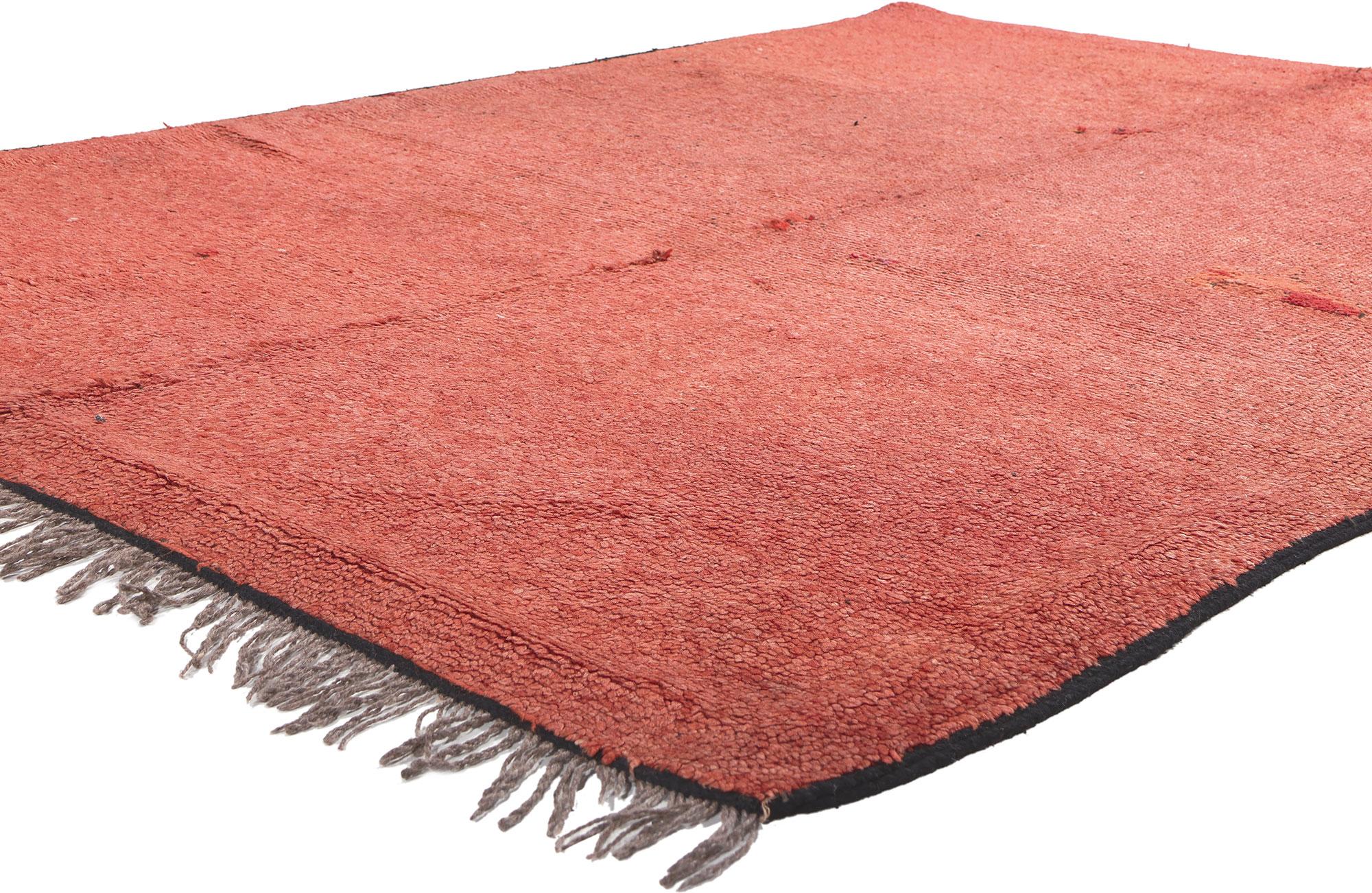 20045 Vintage Berber Moroccan Rug, 05'06 X 07'08. 
​Immerse yourself in the tactile richness of this hand-knotted wool vintage Berber Moroccan rug, where a solid plane of rustic brick red abrash elegantly sprawls across the field. Beyond being a