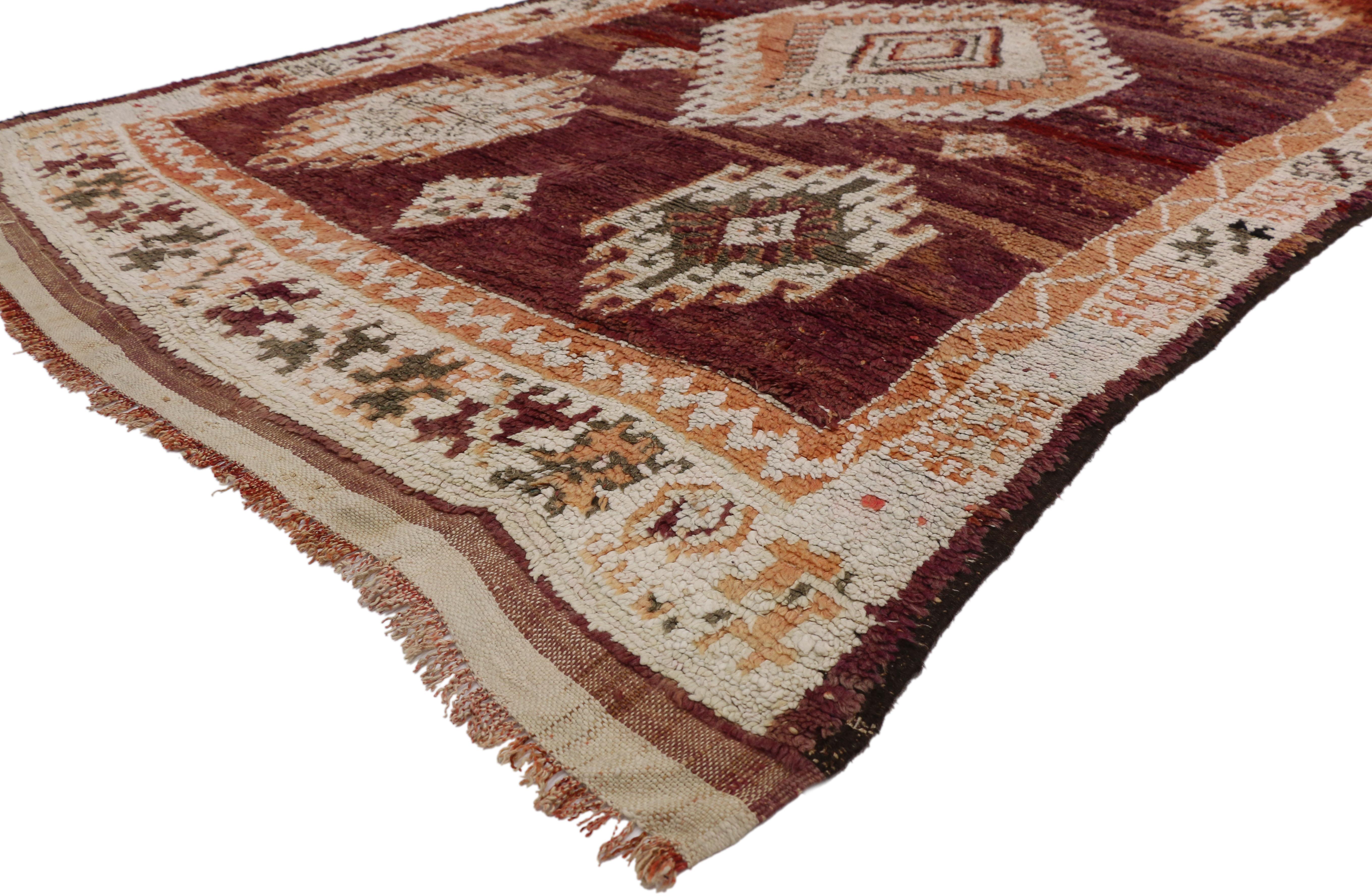 20778, vintage Berber Moroccan rug with Bohemian style. This hand knotted wool vintage Berber Moroccan rug features an all-over geometric design composed of five amulet style medallions with latch-hooks, diamonds and lozenges floating in a sea of