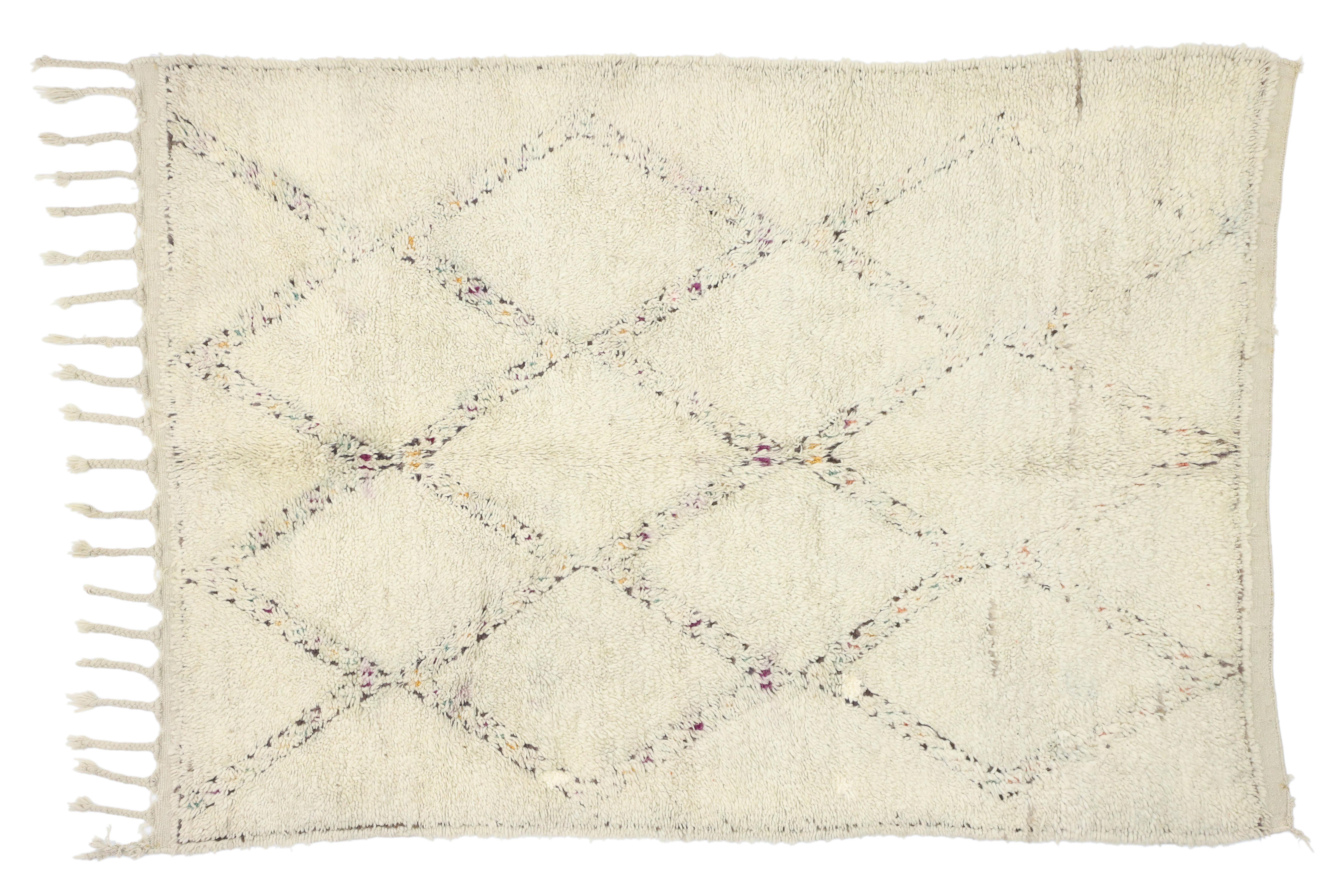 20270 vintage Berber Moroccan rug with Hygge style. This hand knotted wool contemporary Moroccan rug features an all-over diamond lattice pattern spread across an abrashed creamy-beige field. The lattice is comprised of subtle, multicolor dots,