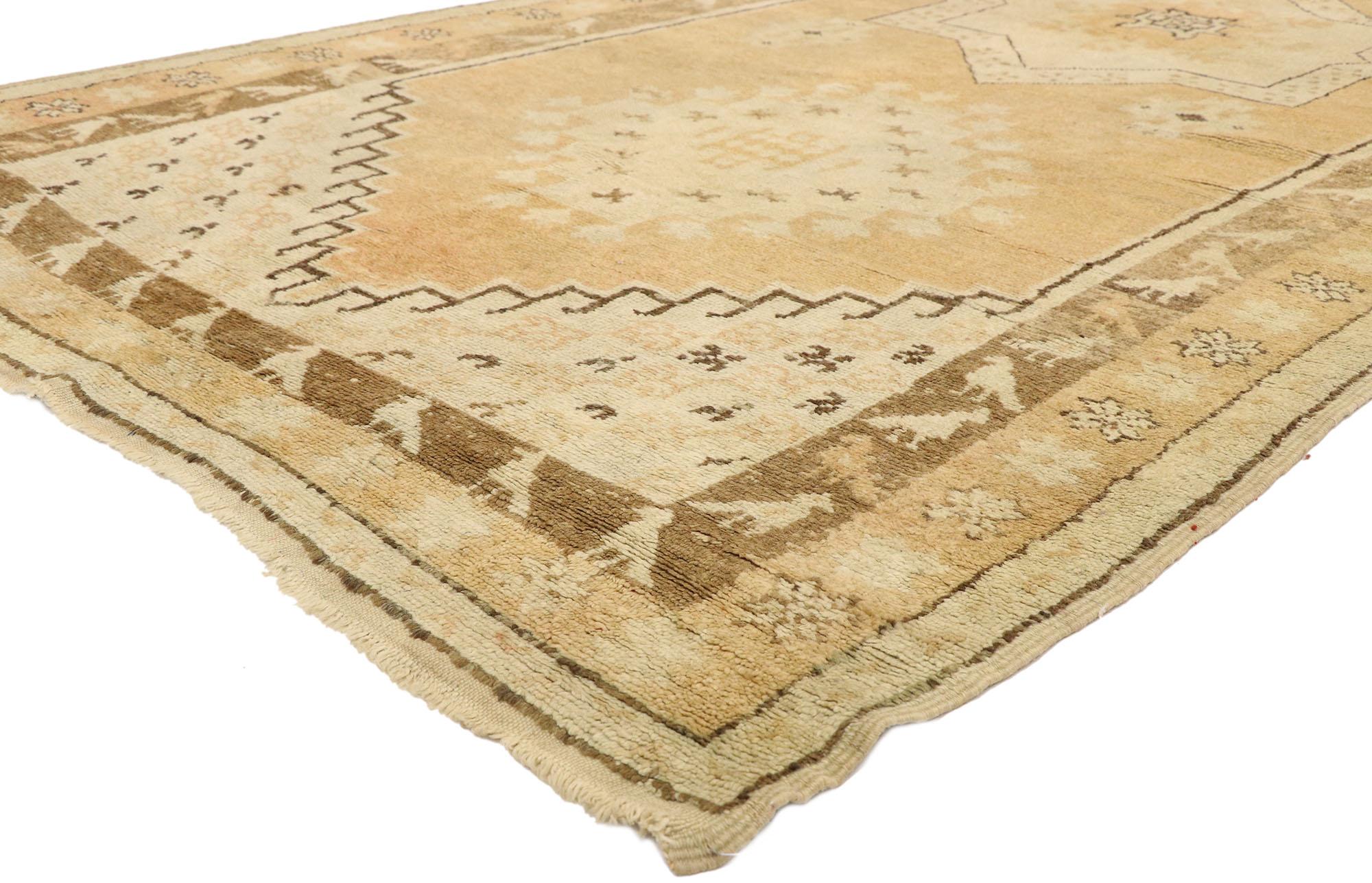 20984, vintage Berber Moroccan rug with organic modern style. This hand knotted wool vintage Berber Moroccan rug features a central eight-point star medallion flanked with a stepped diamond lozenge on either side floating in an abrashed tan and ecru