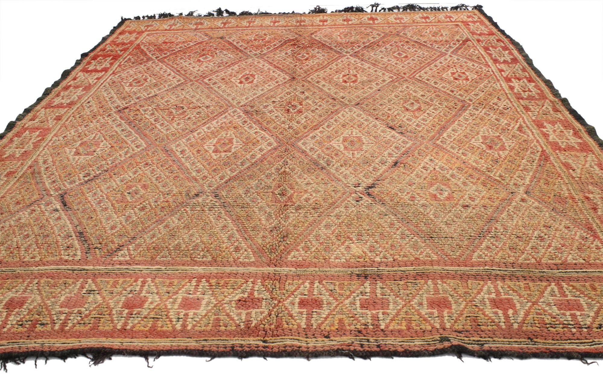 20615, vintage Berber Moroccan rug with tribal style. Muted shades of red and beige contrast to allow the intricate detail of the woven geometric motifs to take the foreground of this vintage Berber Moroccan rug. The diamond shape that is repeated