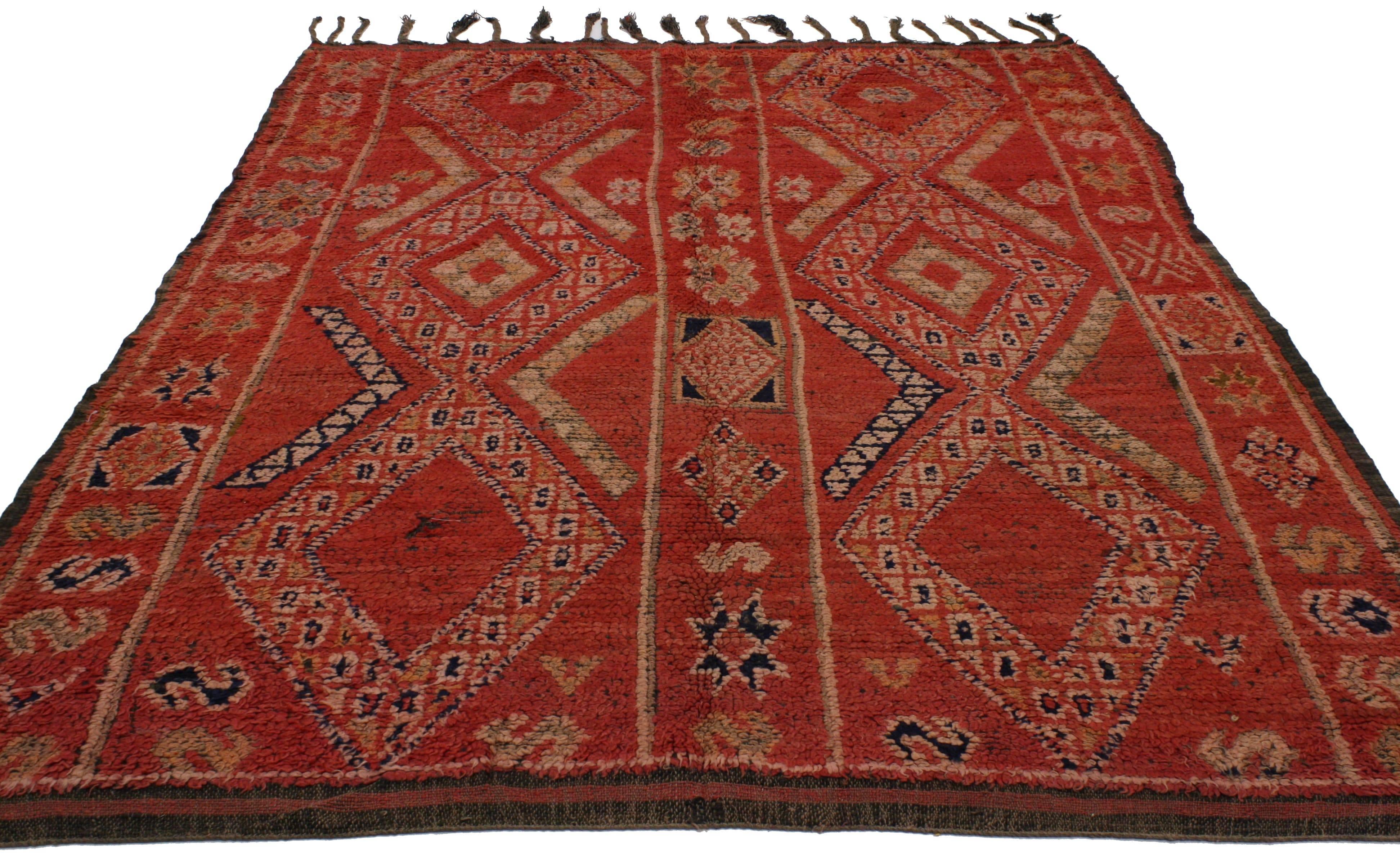 20248, Vintage Berber Moroccan Rug with Tribal Style. Variegated shades of red provide a beautiful backdrop for the intricately woven diamonds that ornament this hand-knotted wool vintage Berber Moroccan rug. More than the asymmetrical beauty found