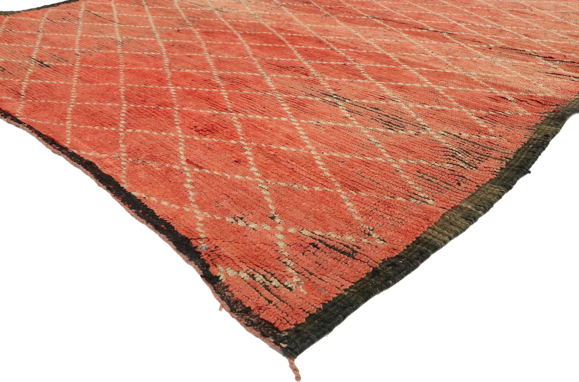 20613 vintage Berber Moroccan rug with tribal style. Subdued red emits a feeling of warmth and closeness in this vintage Berber Moroccan rug. The tribal style print weaves into small cream-colored diamonds throughout the piece. The diamond, in