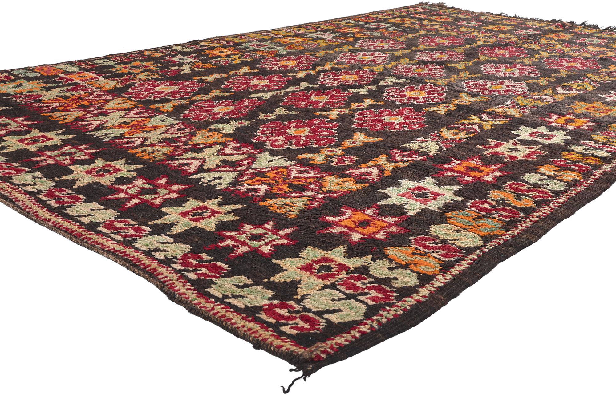 20722 Vintage Beni MGuild Moroccan Rug, 06'00 x 09'00. In the enchanting convergence of Midcentury Modern and nomadic allure, discover the allure of this hand-knotted wool vintage Beni Mguild Moroccan rug—a treasure from the western central Middle