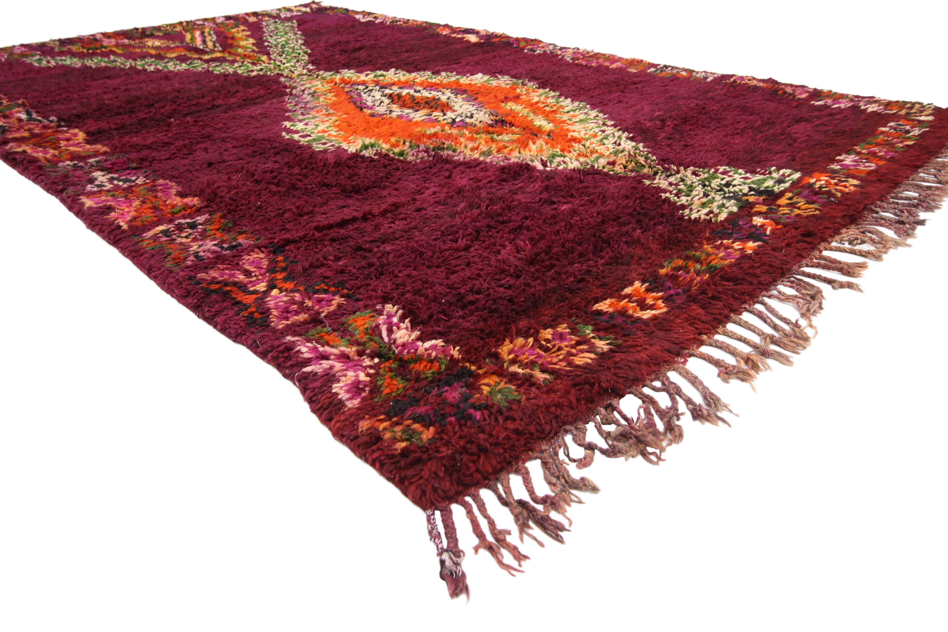 20692, vintage Berber Moroccan Boujad rug with tribal style, Moroccan Berber carpet. This hand-knotted wool vintage Moroccan rug hosts various reproductive symbols that carry great meaning in Ancient Berber culture. Taking center stage is a large