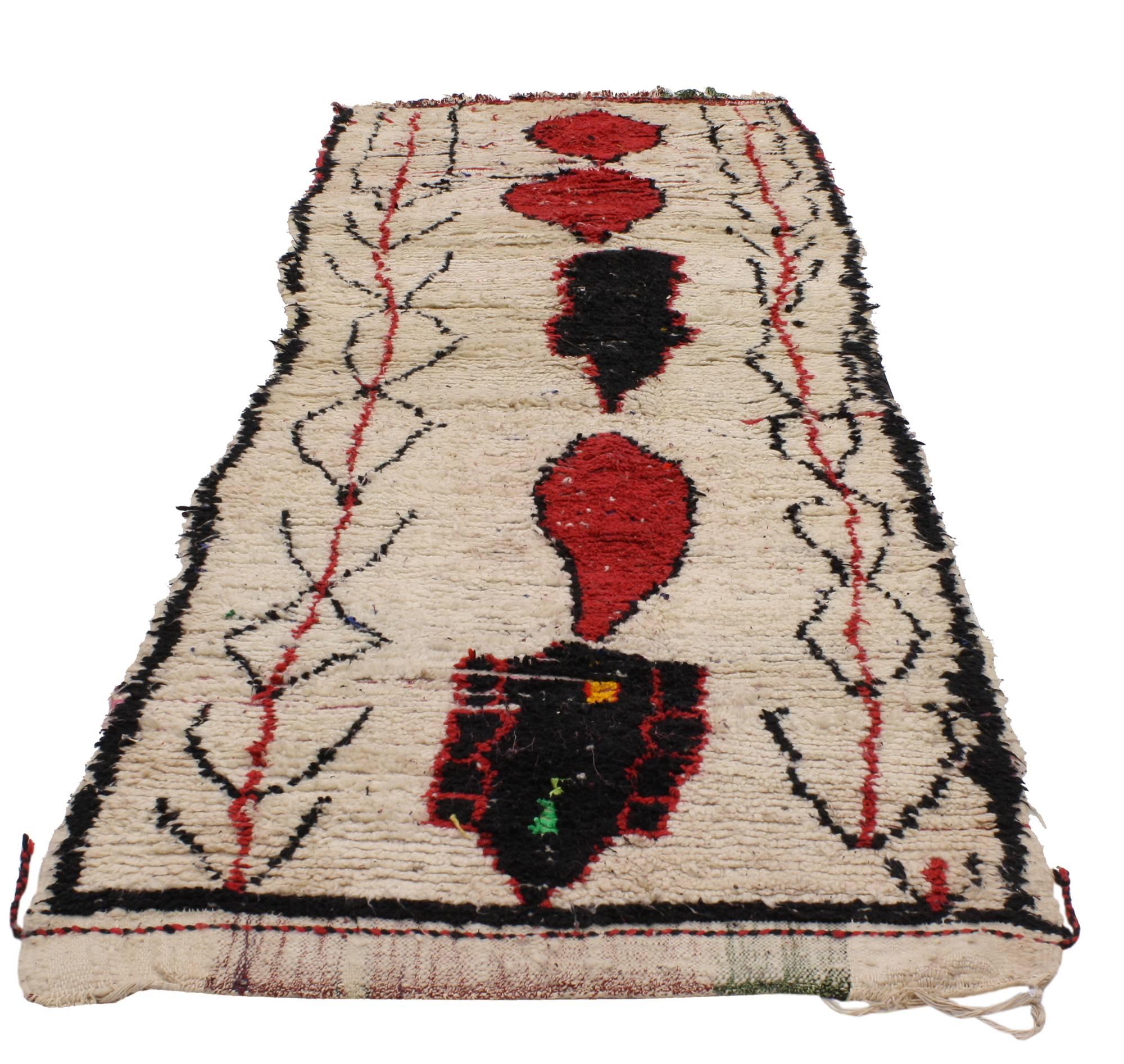20372 Vintage Berber Moroccan Runner with Tribal Style, Shag Hallway Runner 03'07 x 09'06. The symbols presented over the beige background substantiates the significance of the patterns woven into this vintage Berber Moroccan carpet runner. Without