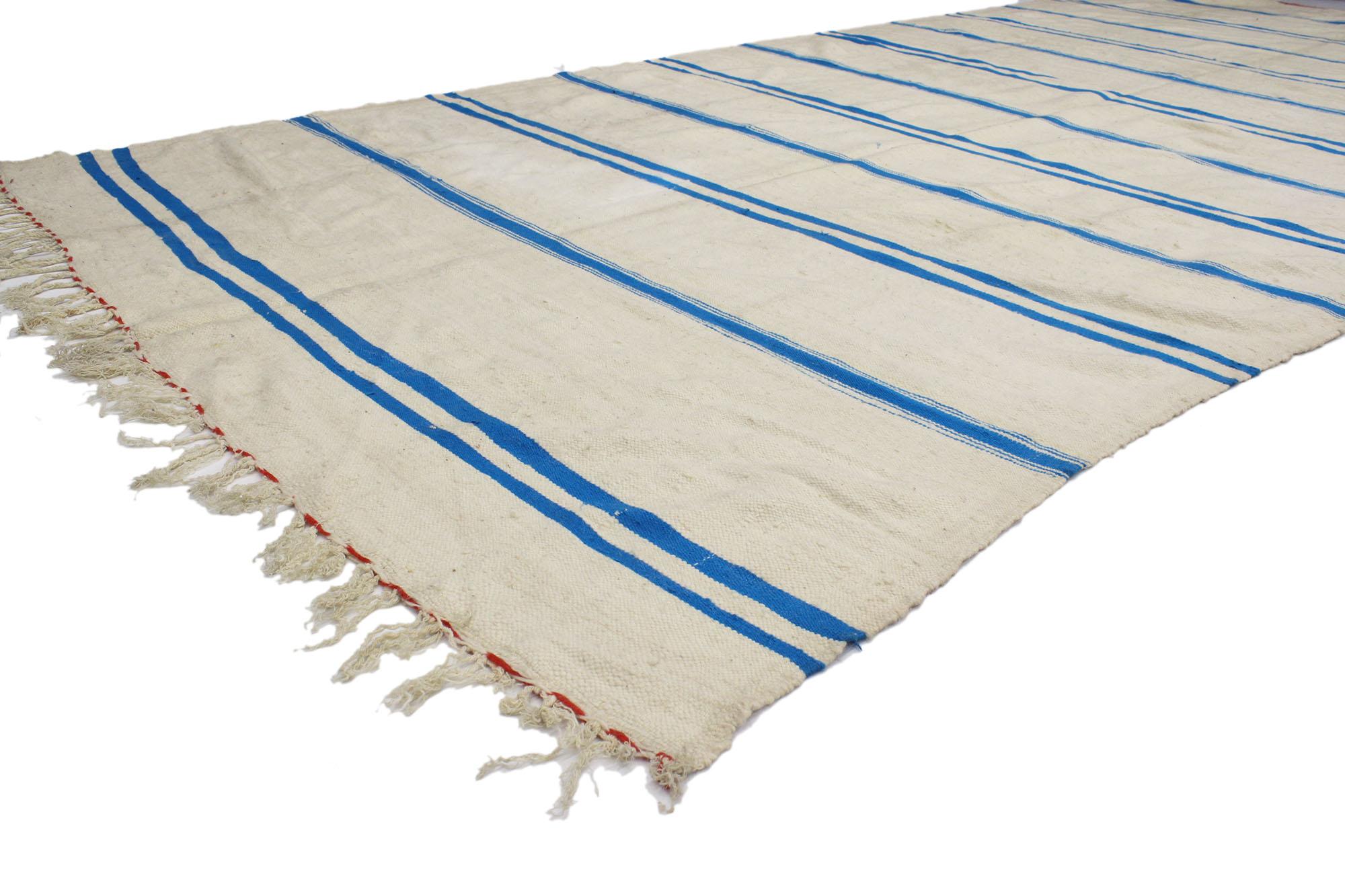 20552 Vintage Berber Moroccan Striped Kilim Rug with Relaxed Coastal Style 05'10 x 12’02. With its simplicity, relaxed coastal style, bohemian vibes, this hand-woven wool vintage Berber Moroccan kilim rug is a captivating vision of woven beauty. The