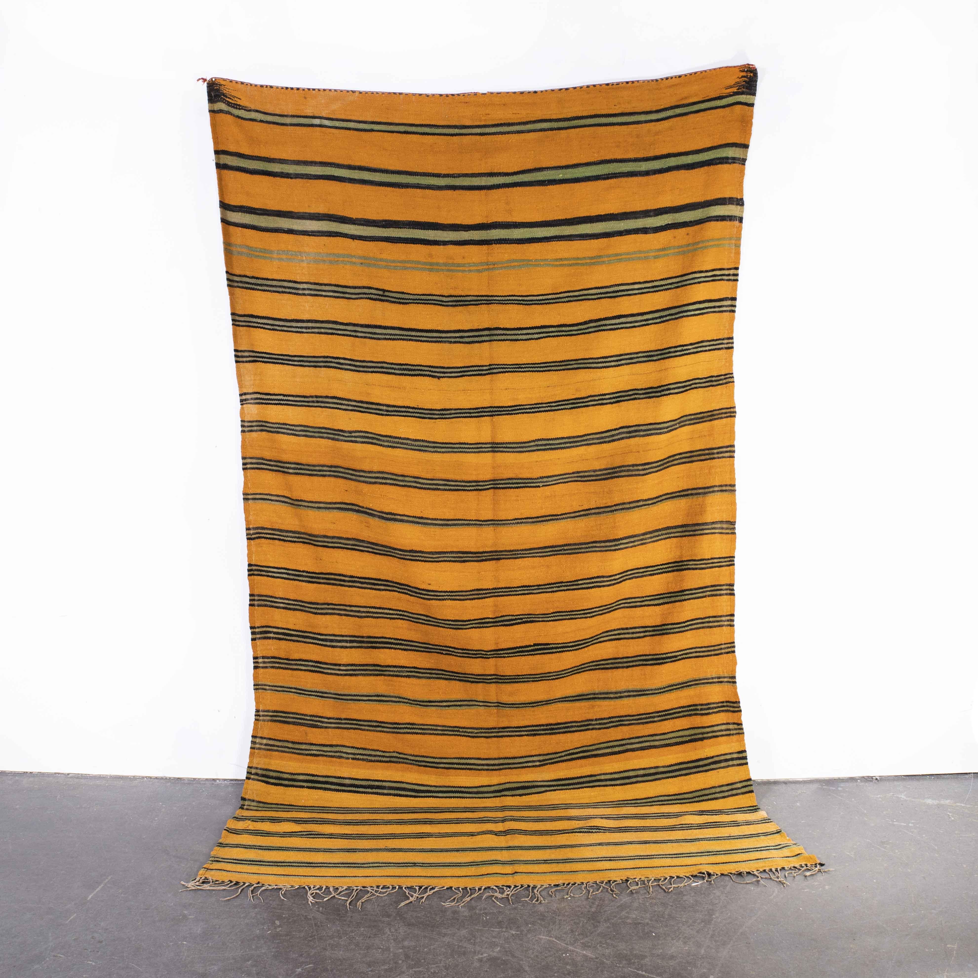 Vintage Berber Orange Stripe Hanbel Rug
Vintage Berber Orange Stripe Hanbel Rug. These are flat-woven rugs (Hanbel in Arabic) which are light in weight due to the lack of pile. They are often used on floors in hotter countries as they are easy to