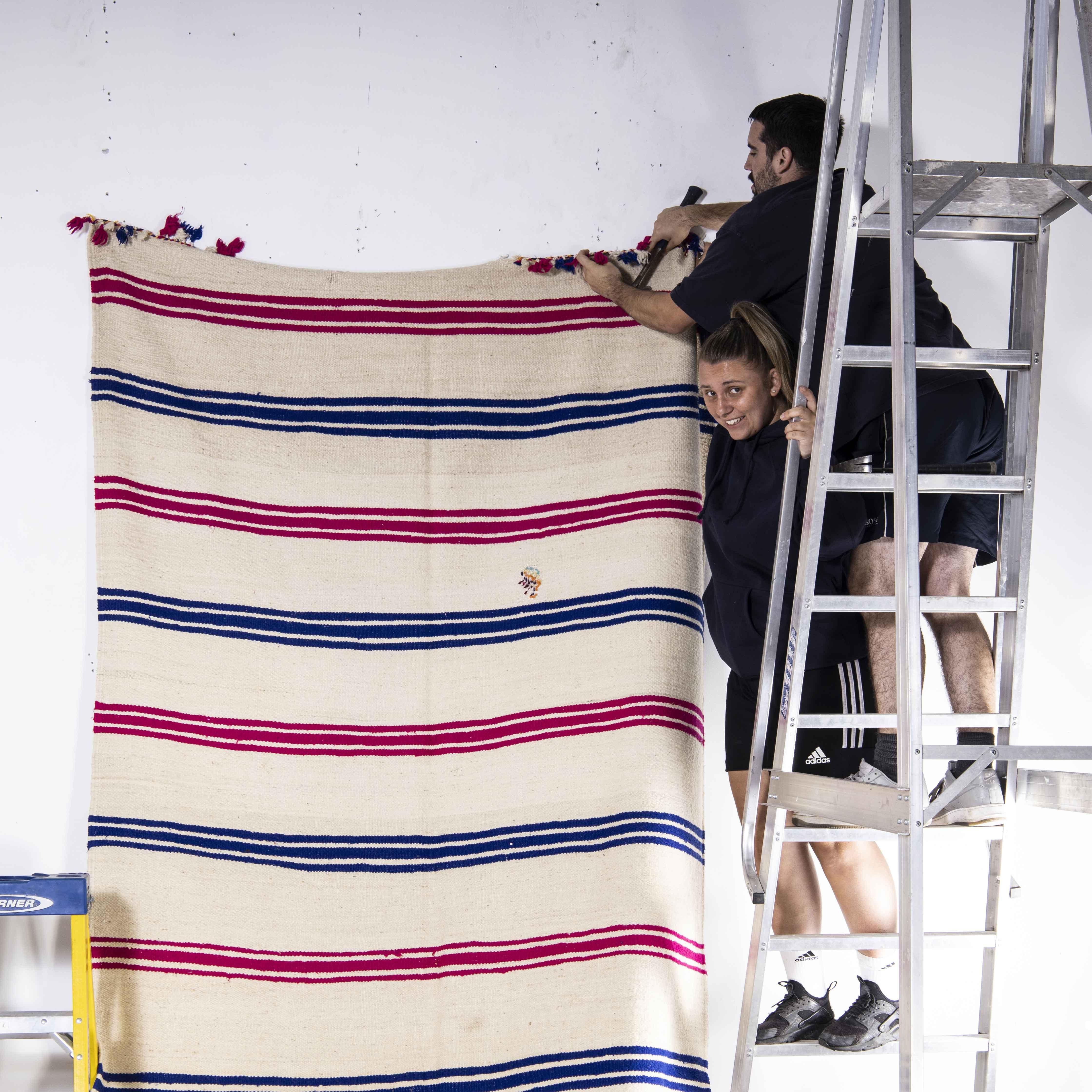 Vintage berber red and blue thin stripe hanbel rug
Vintage berber red and blue thin stripe hanbel rug. These are flat-woven rugs (Hanbel in Arabic) which are light in weight due to the lack of pile. They are often used on floors in hotter countries