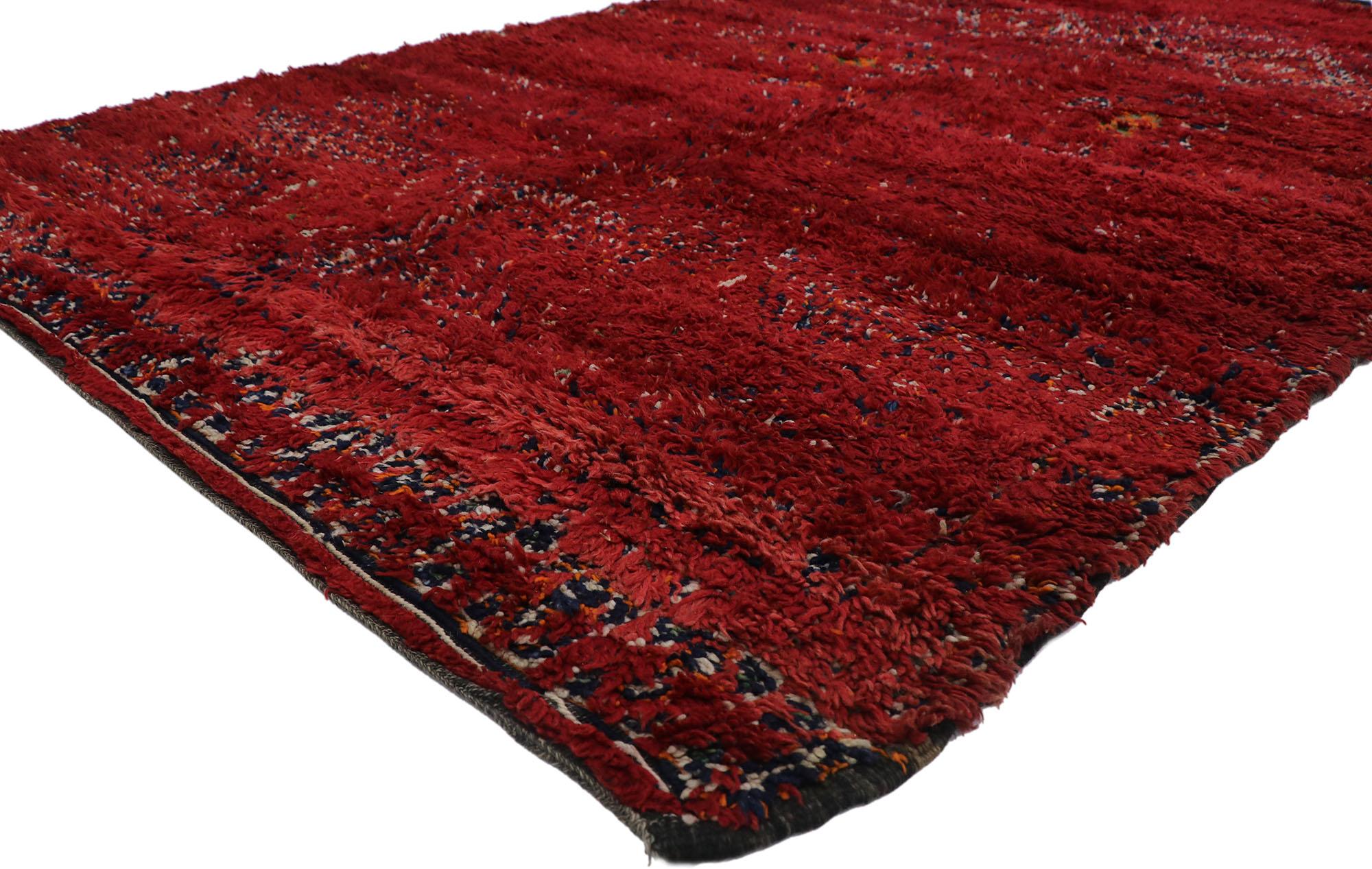 21274 Vintage Berber Red Beni M'Guild Moroccan rug with Tribal Style 06'05 x 10'05. With its simplicity, plush pile and tribal style, this hand knotted wool vintage Beni M'Guild Moroccan rug is a captivating vision of woven beauty. The abrashed red