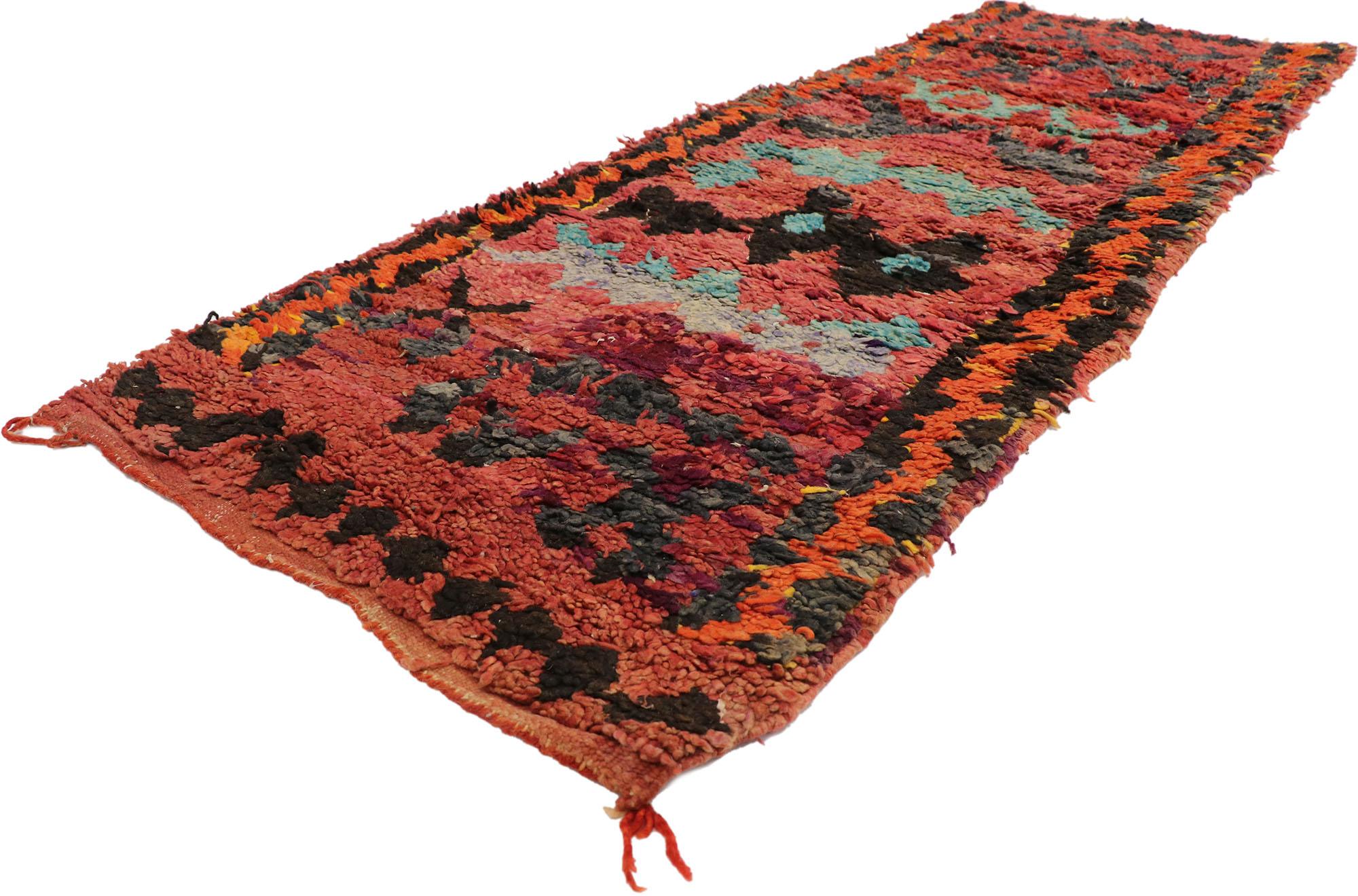 21581 Vintage Berber Red Moroccan Rug, 02'07 x 07'04.
Boho bungalow meets tribal style in this hand knotted wool vintage Berber Moroccan rug. The distinctive tribal elements and eye-catching color scheme woven into this piece work raise the style