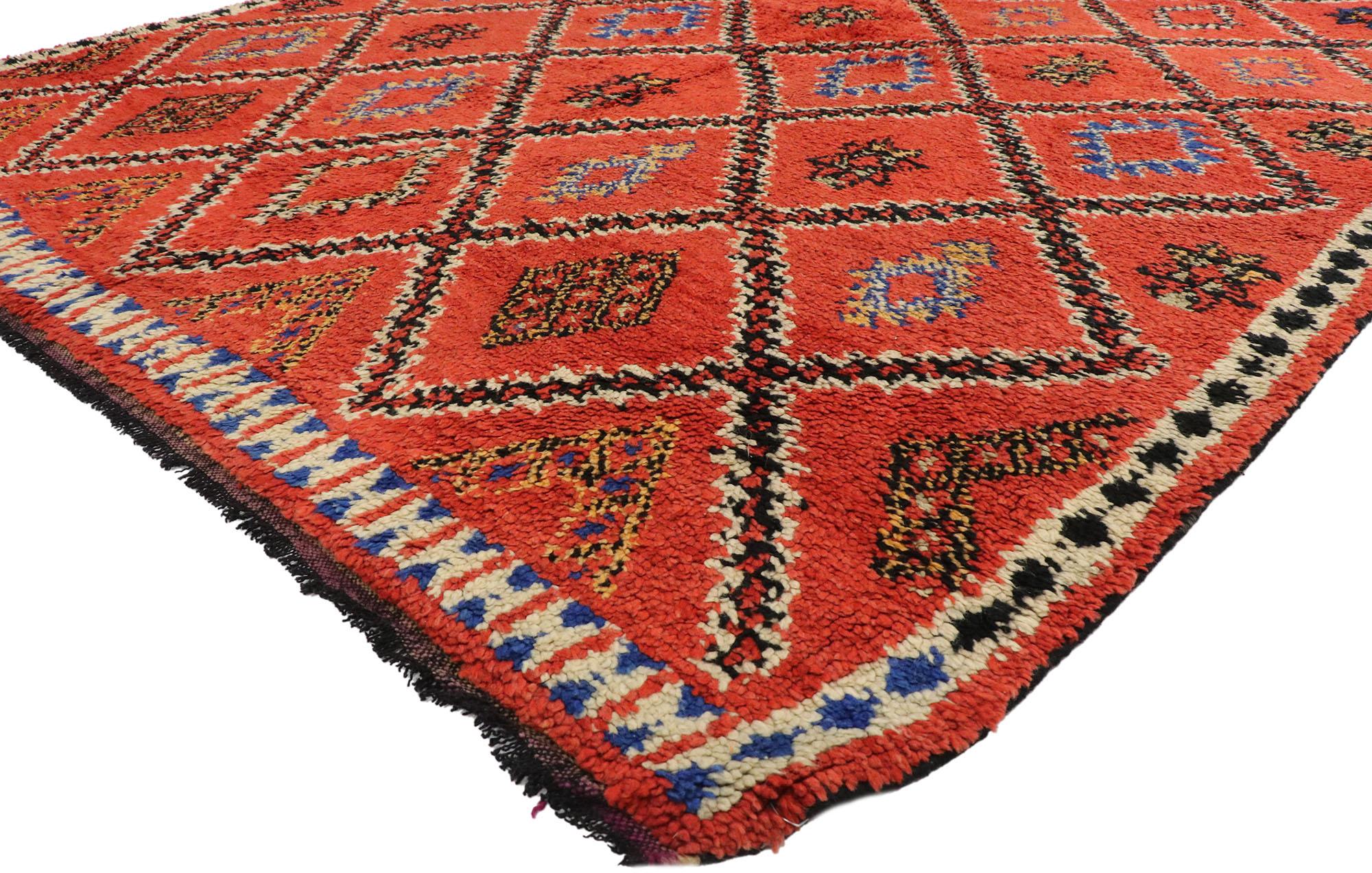 20251, vintage Berber Red Moroccan rug with Modern Northwestern Tribal style. With its bold hues and beguiling beauty, this hand knotted wool vintage Berber Moroccan rug beautifully embodies modern northwestern style with tribal vibes. The abrashed