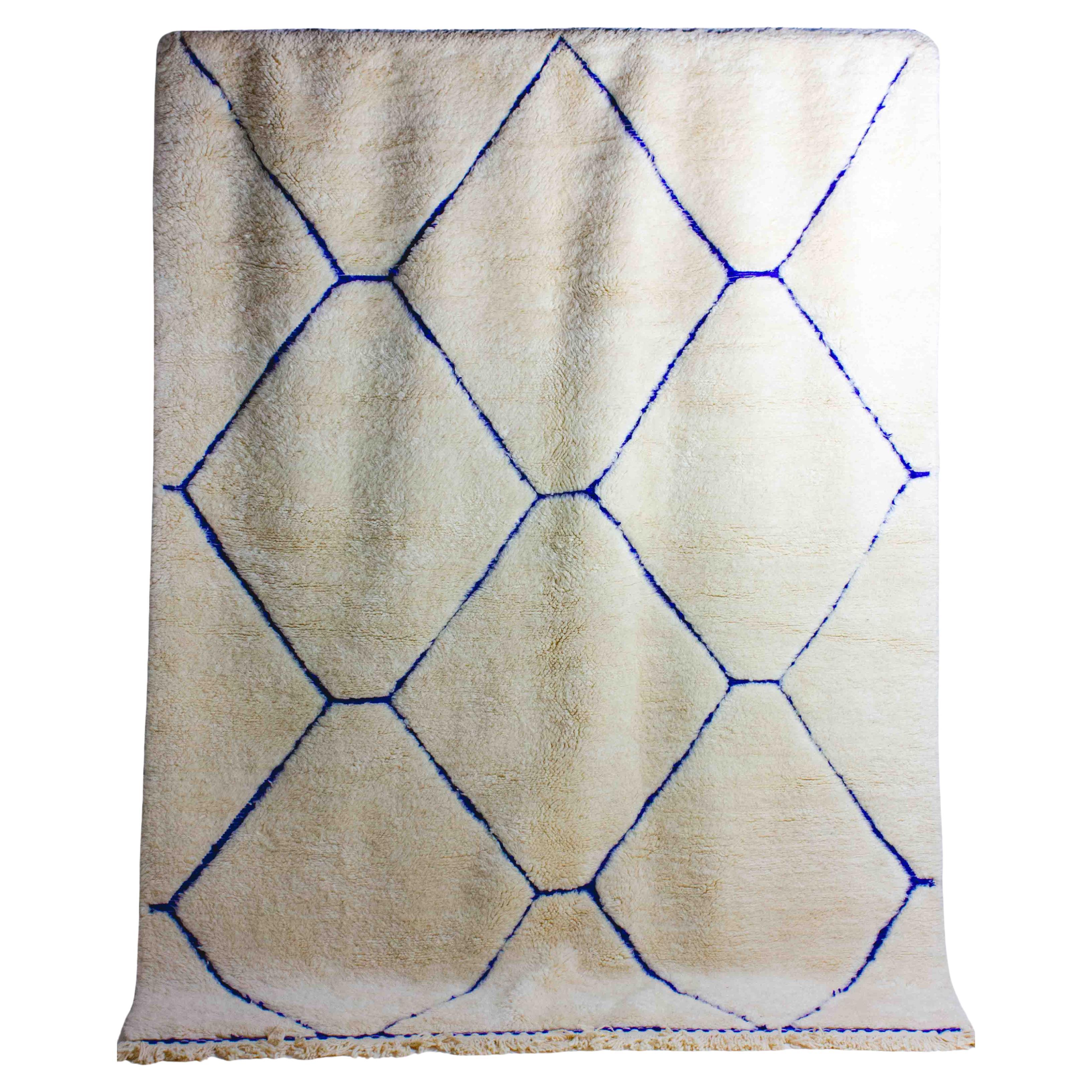 Vintage berber rug in ivory and blue wool