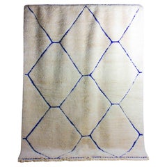 Vintage berber rug in ivory and blue wool