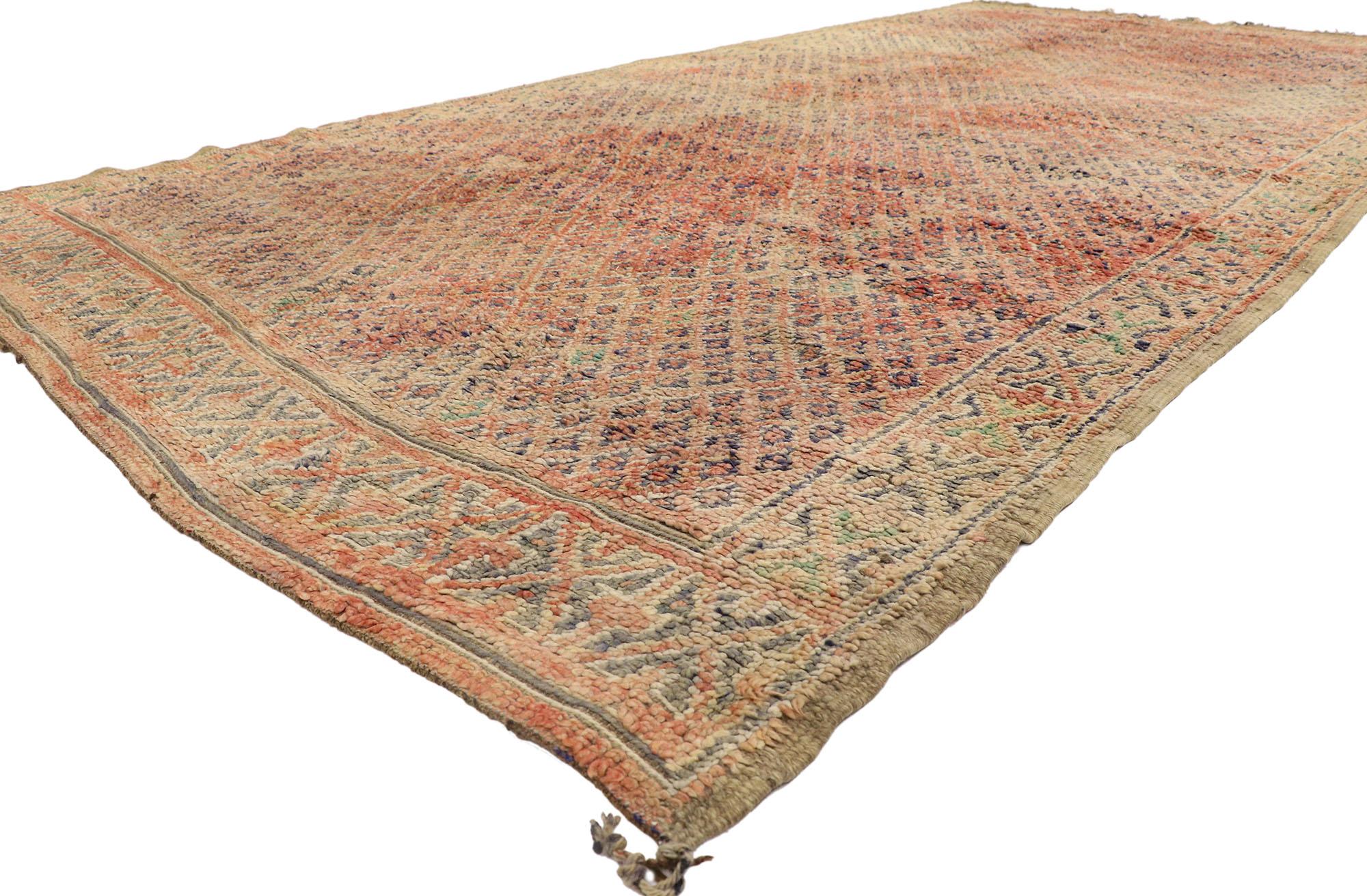 21438 Vintage Beni MGuild Moroccan Rug, 08'05 x 12'01. Originating from the Beni M'Guild tribe nestled in Morocco's Middle Atlas Mountains, Beni M'Guild rugs epitomize a cherished tradition meticulously handcrafted by skilled Berber women. These