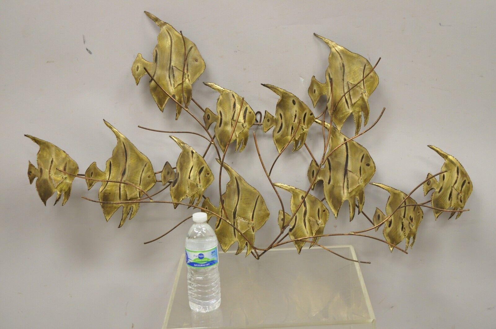 Vintage Bergasse Mid-Century Modern brass metal school of fish wall sculpture. Item features a signed 