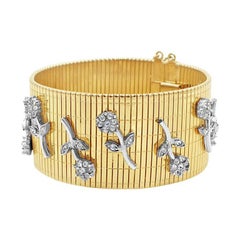 Vintage Bergere Flexible Gold Bracelet with Silver Flowers Circa 1960s